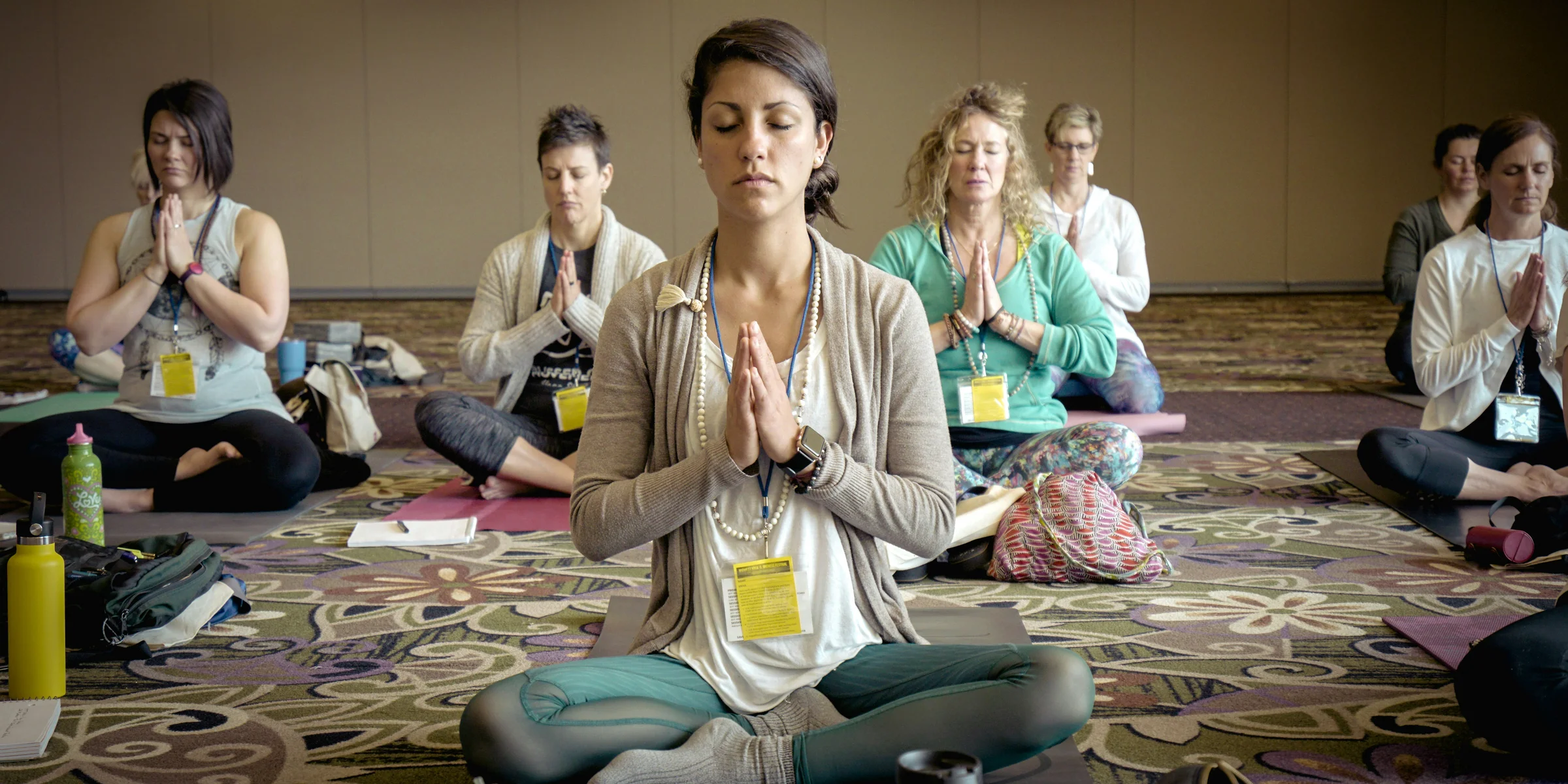 group of people doing yoga.