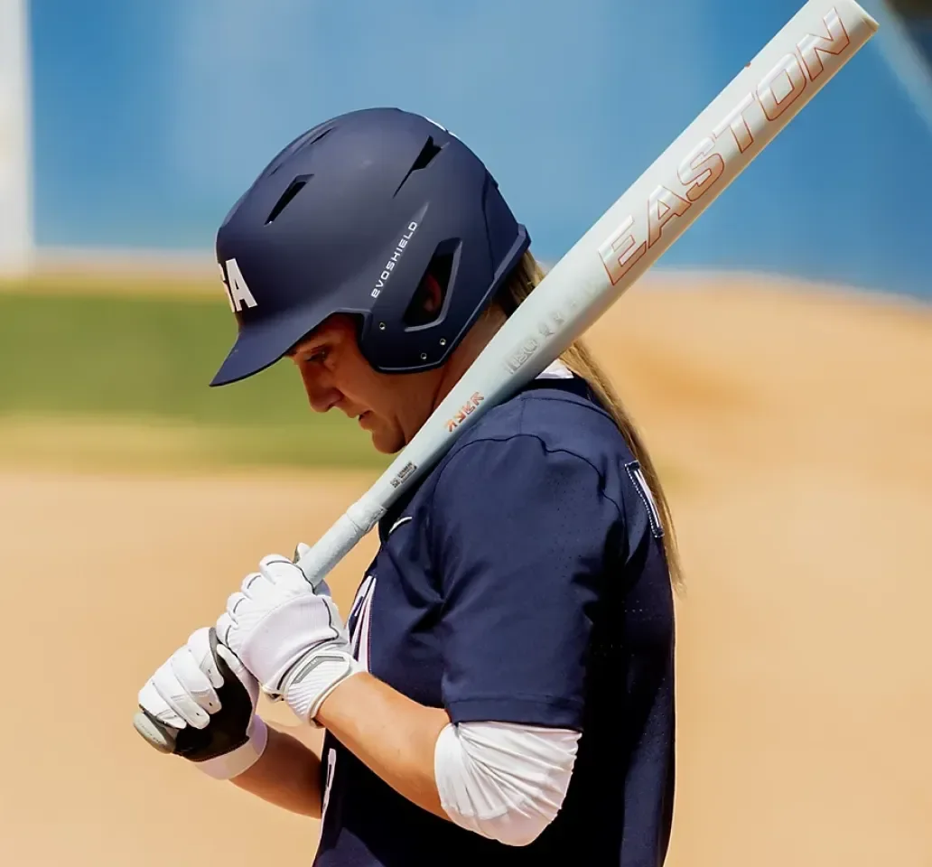 Softball imagery featuring EASTON Fastpitch Bat