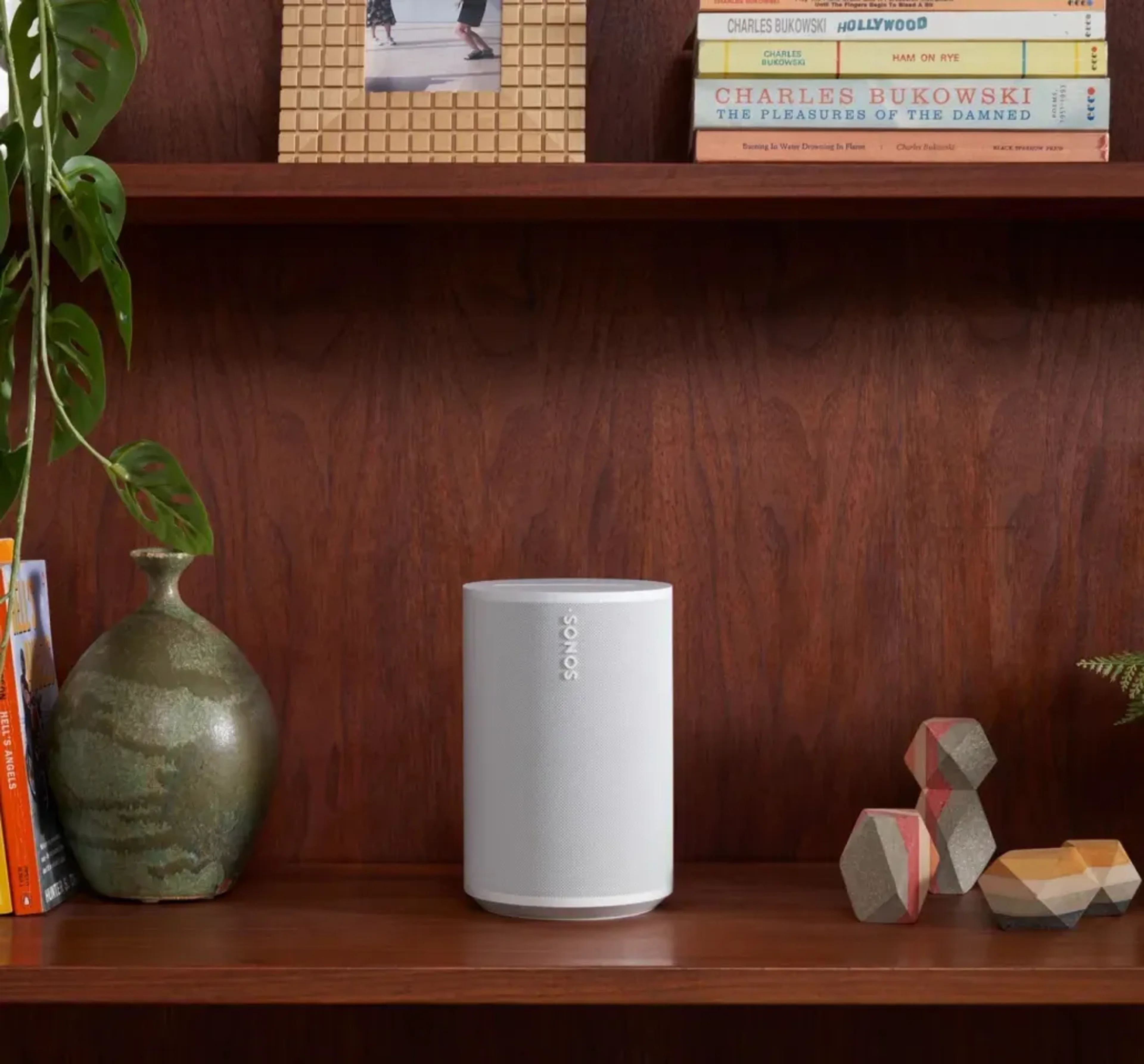 Tech imagery featuring Era 100 Smart Speaker