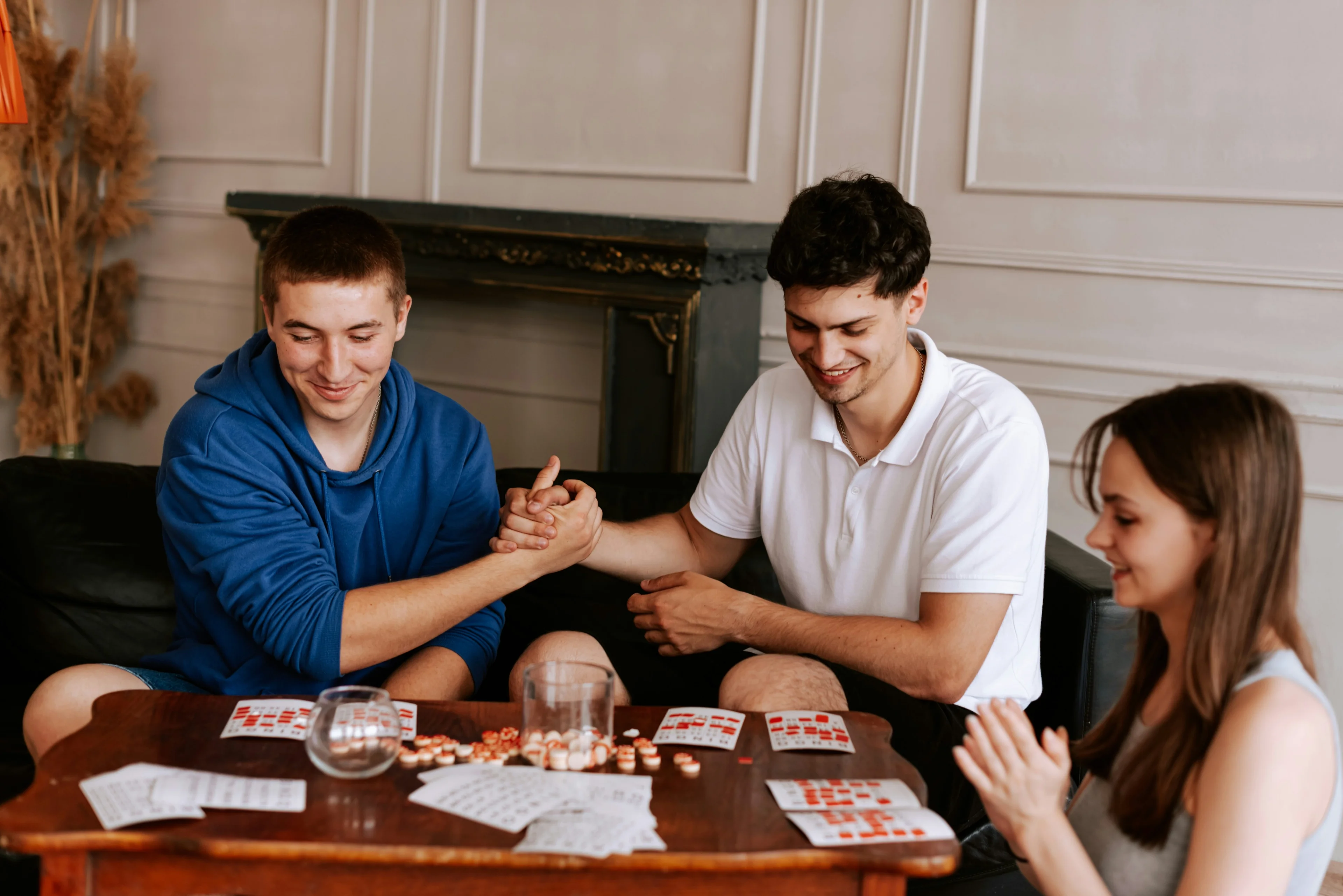Happy people playing board games