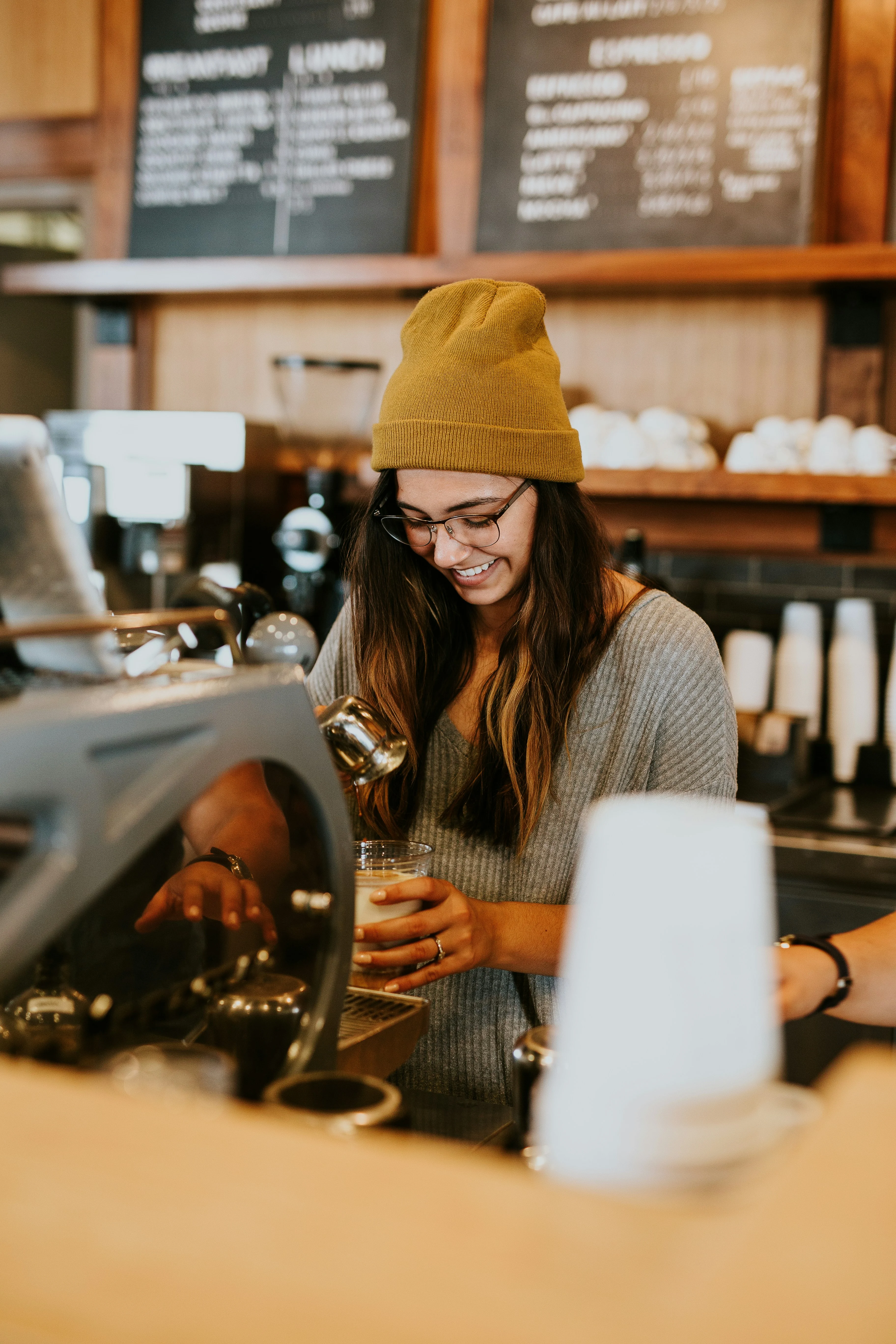 Happy person at a coffee shop