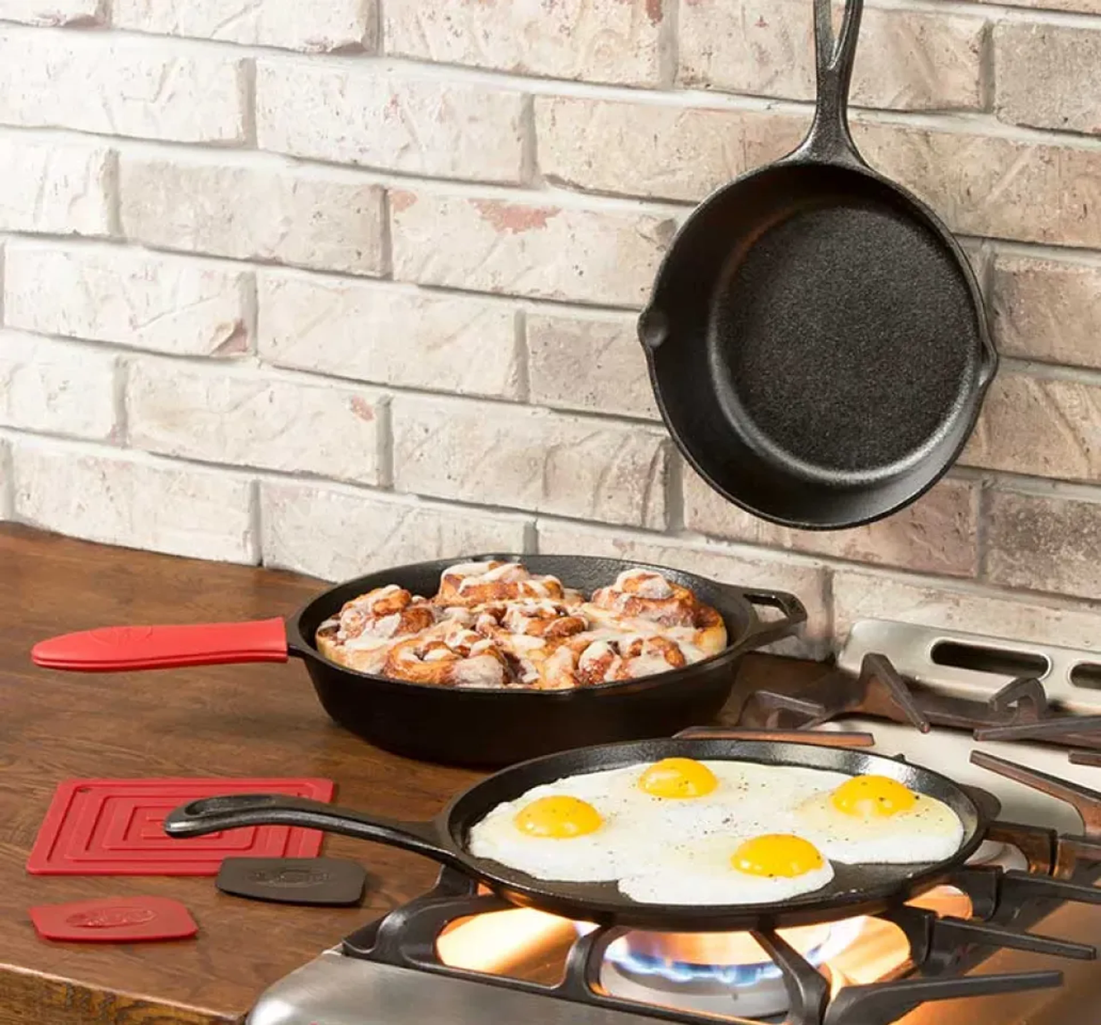 Cooking imagery featuring Essential Seasoned Cast Iron Skillet Set
