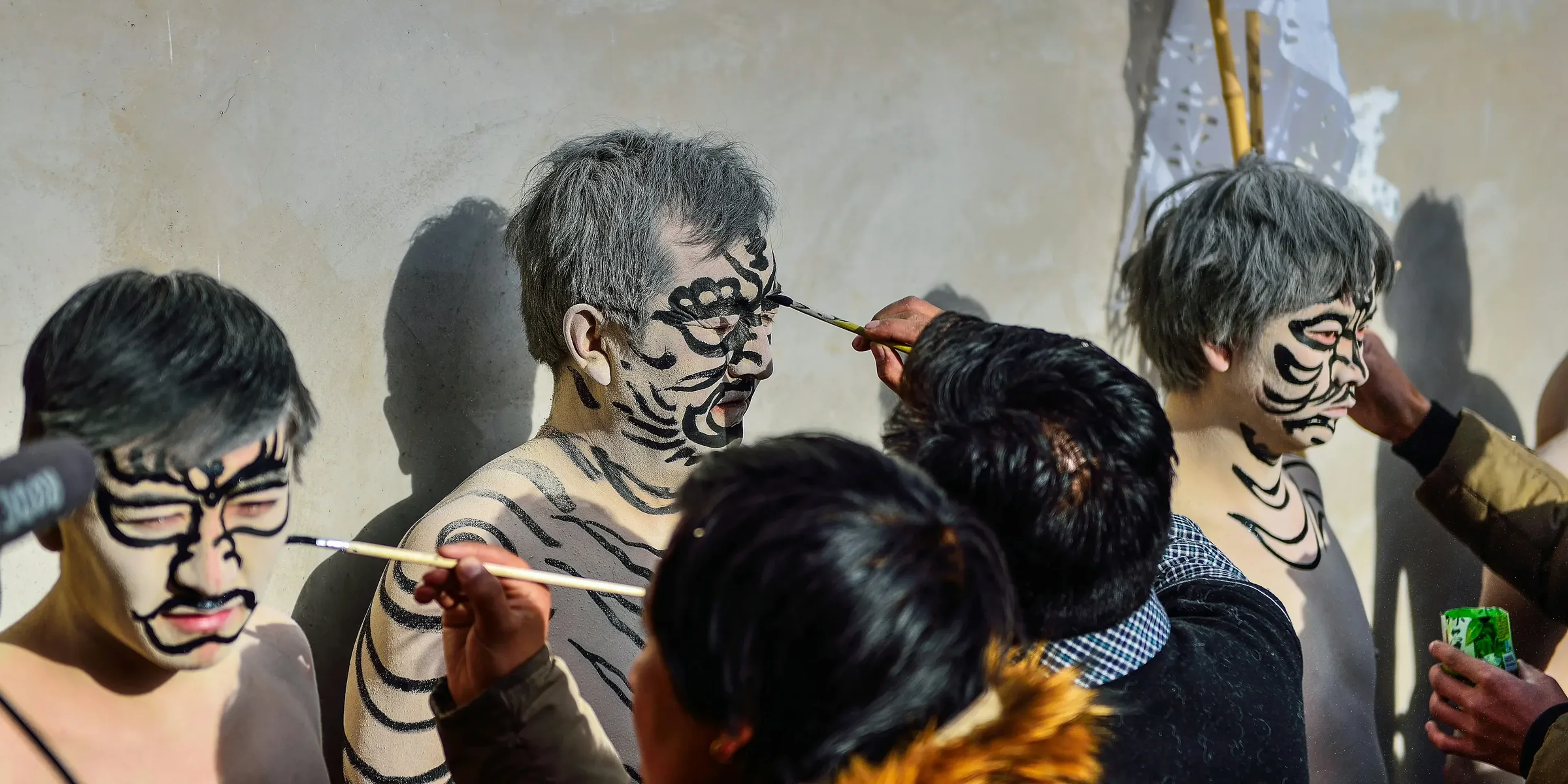 a group of people with paint on their faces