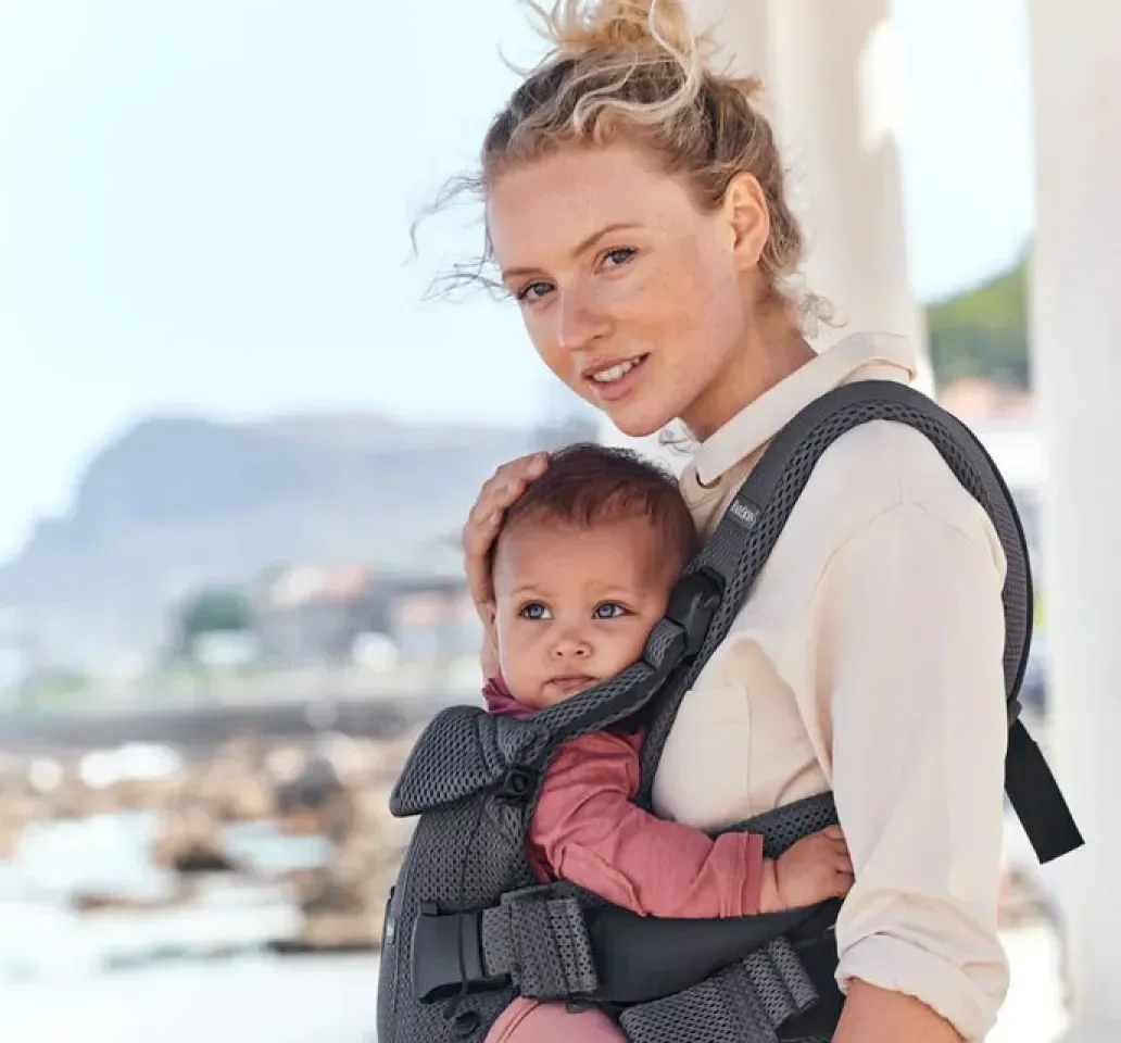 Baby care imagery featuring Baby Carrier One Air