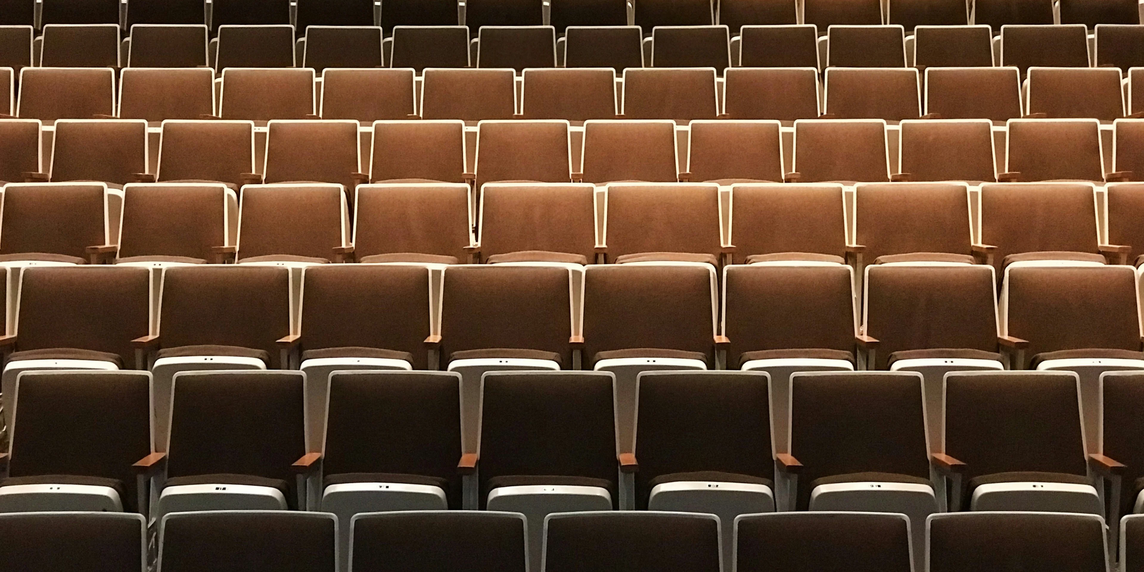 empty brown theater chairs