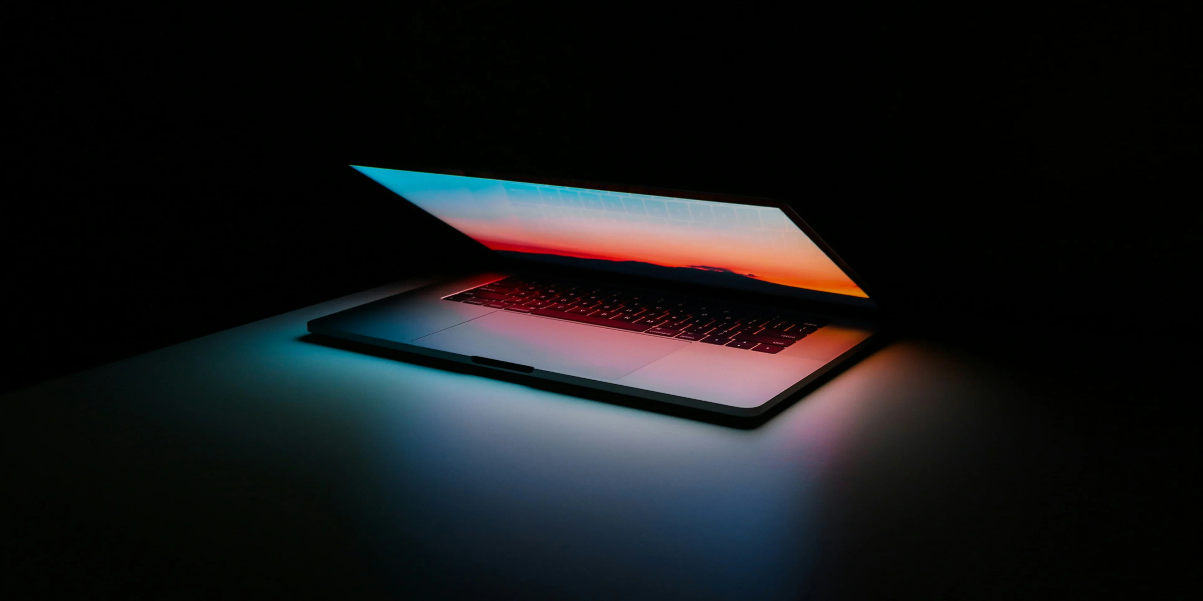 gray and black laptop computer on surface.