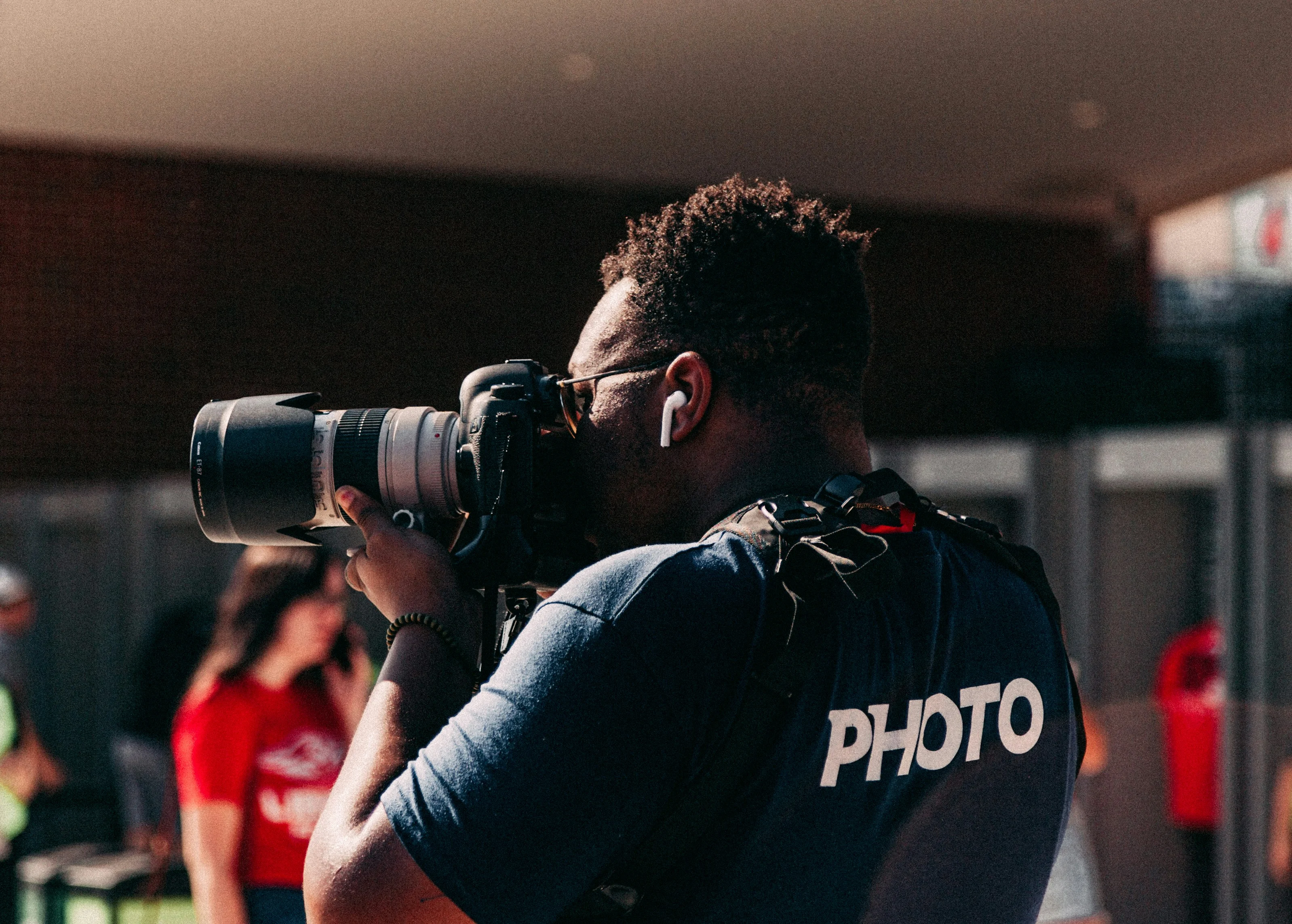 man taking a photo with a camera