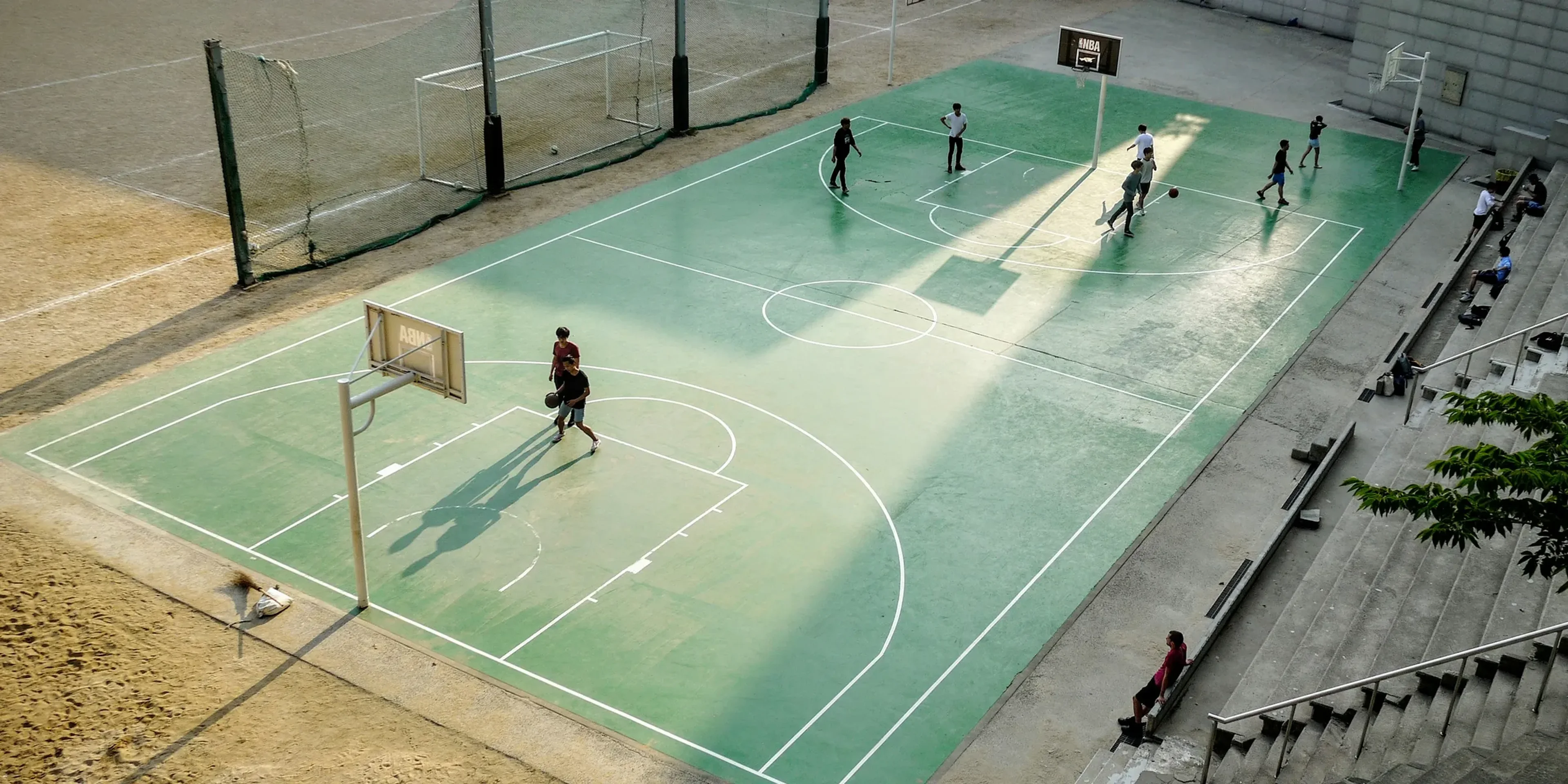 aerial photo of people at basketball court