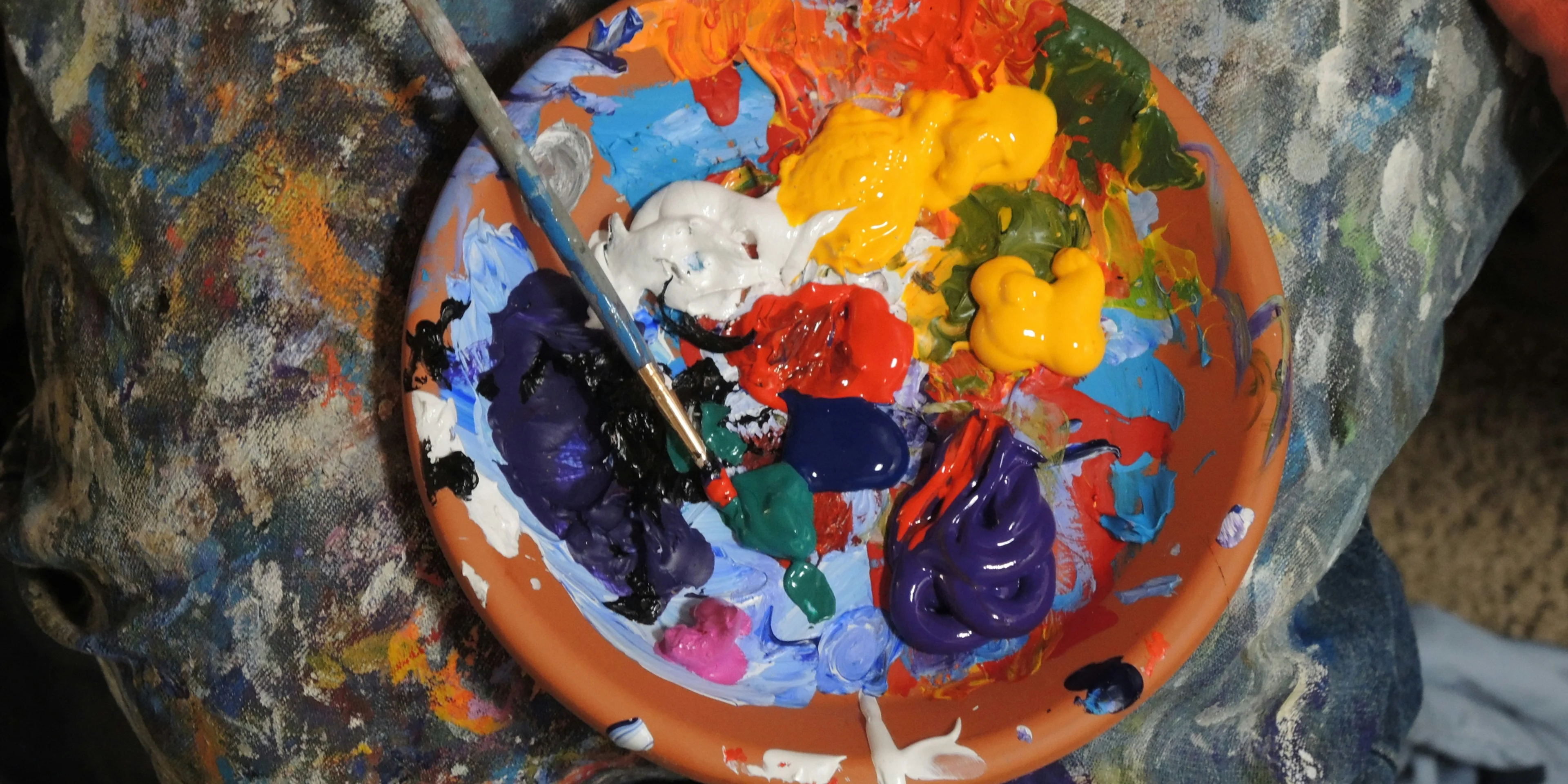 mixed paints in a plate.