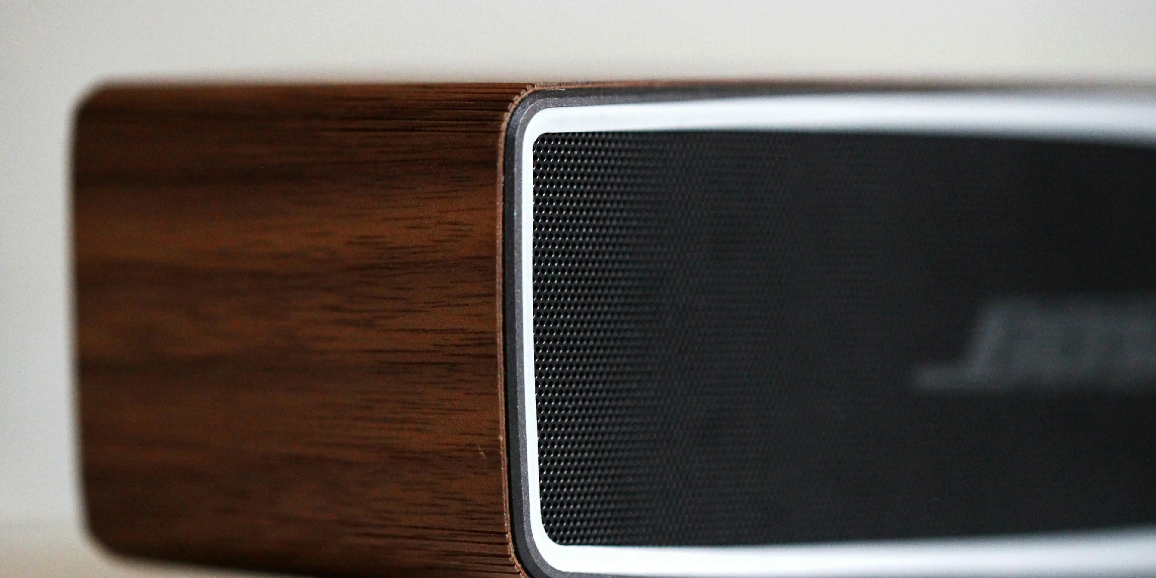 selective focus photography of black Bose speaker