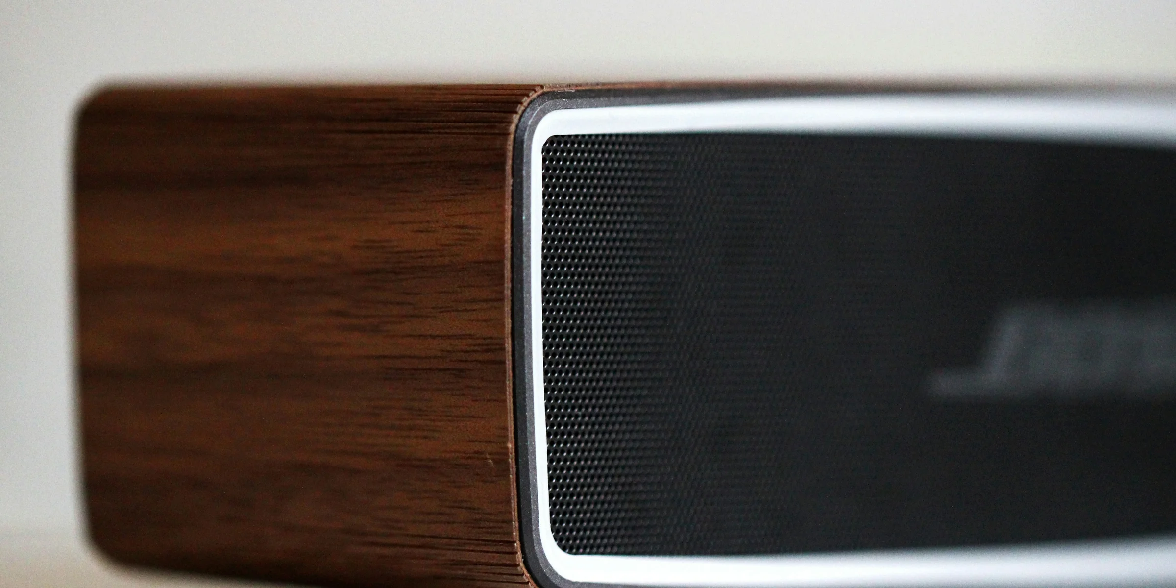 selective focus photography of black Bose speaker