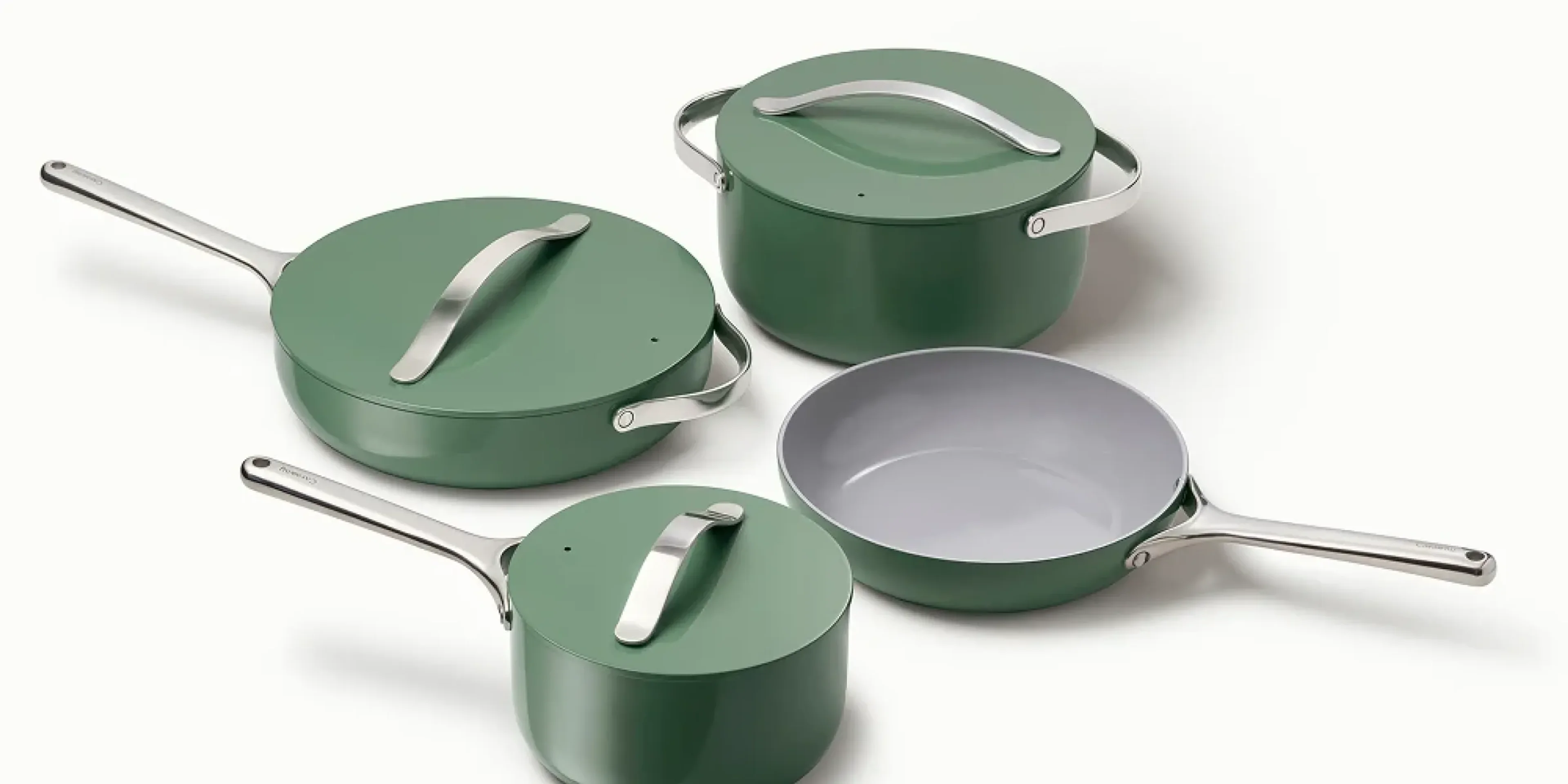 green pots and pans on a neutral background