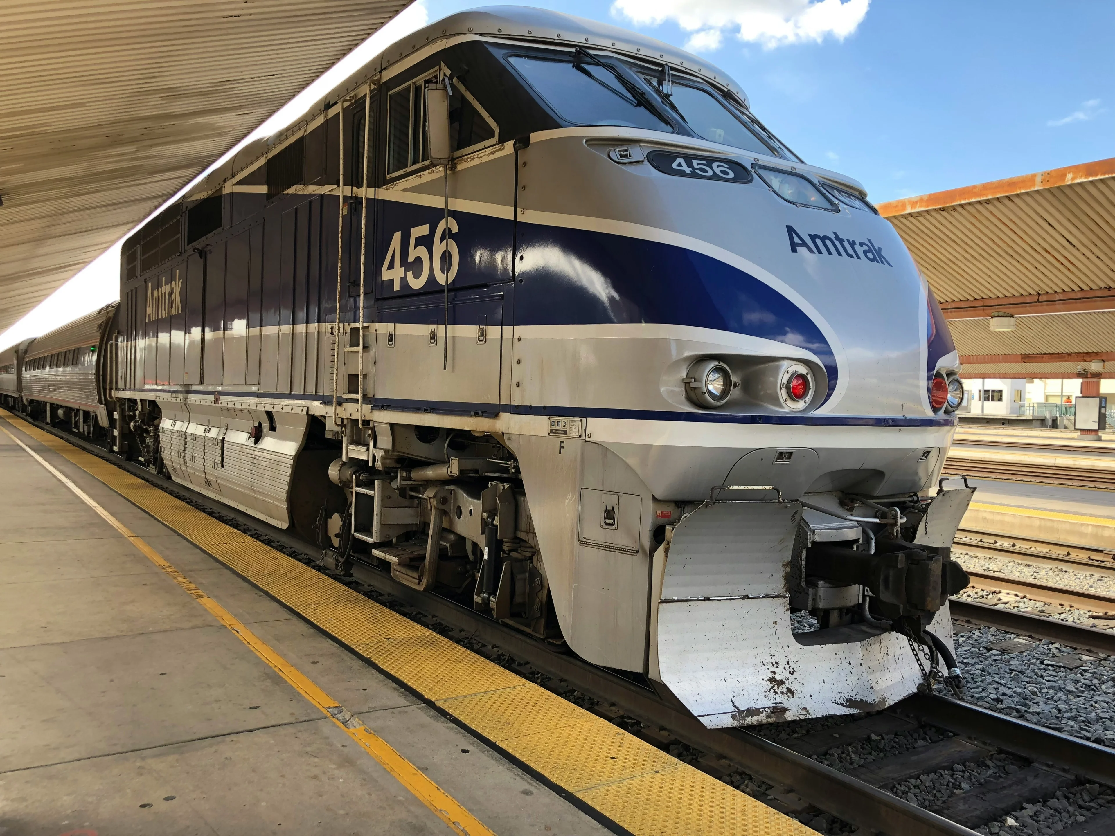 Train traveling through landscape
