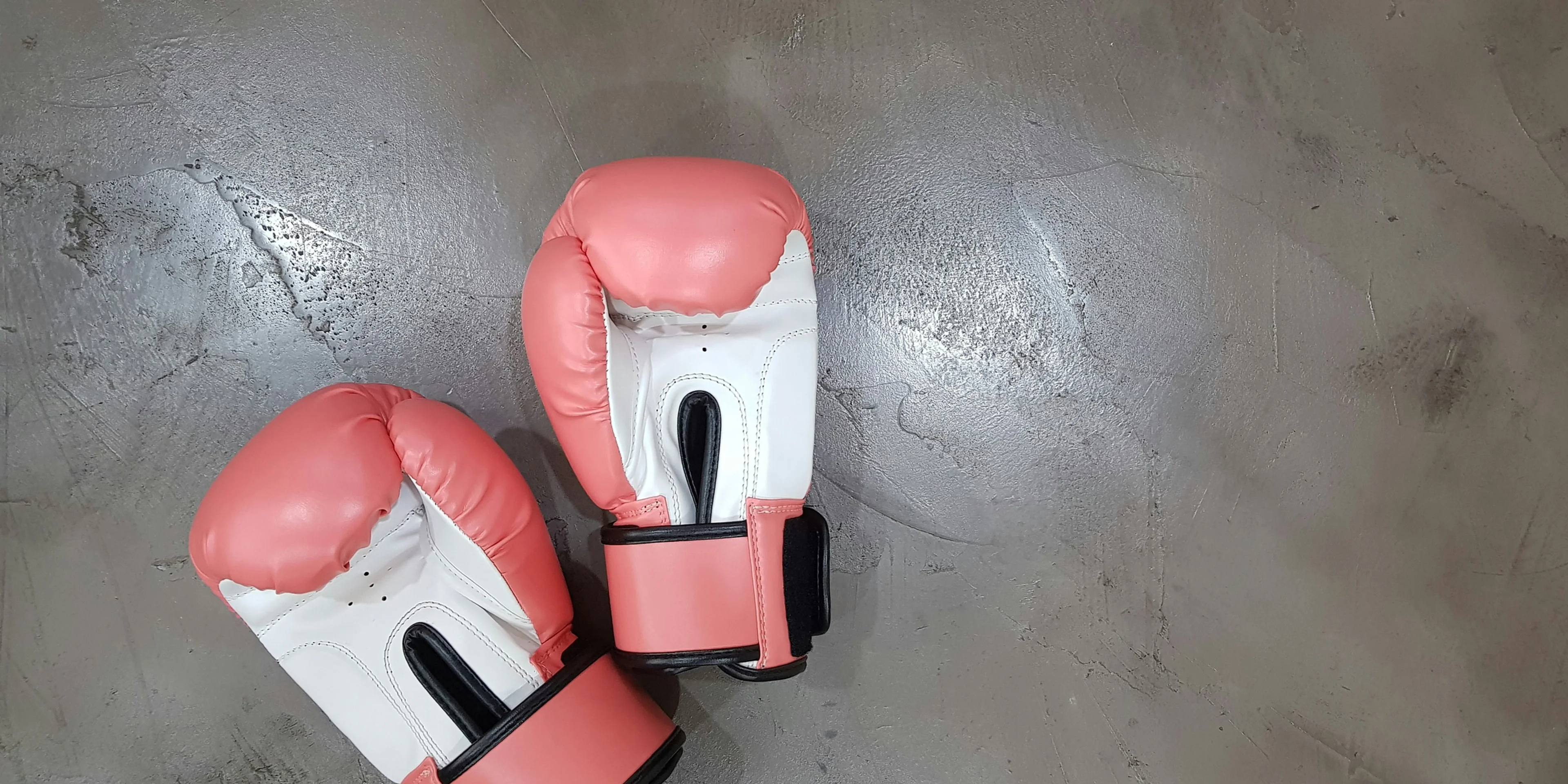 pair of pink boxing gloves.