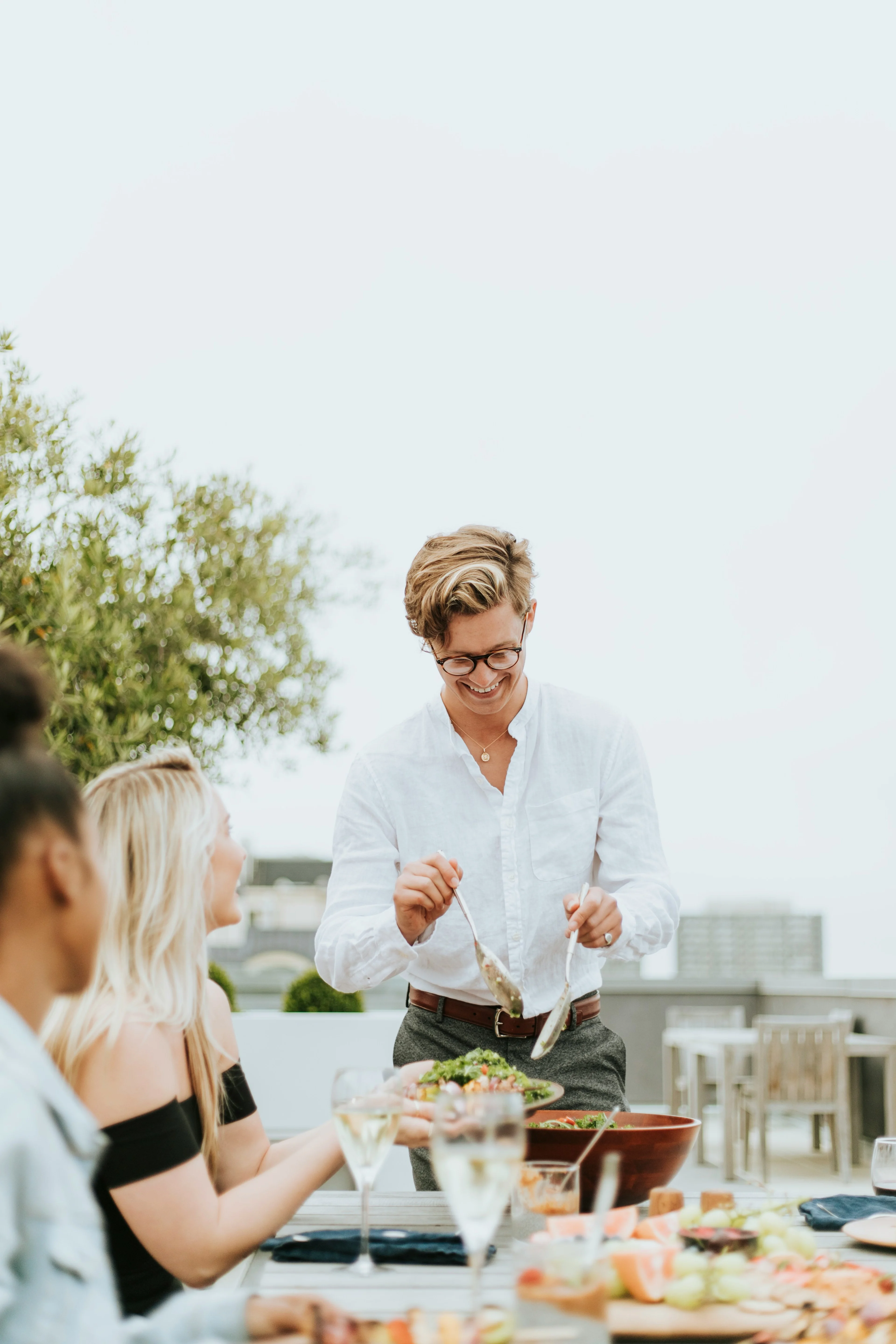 happy people eating lunch outside