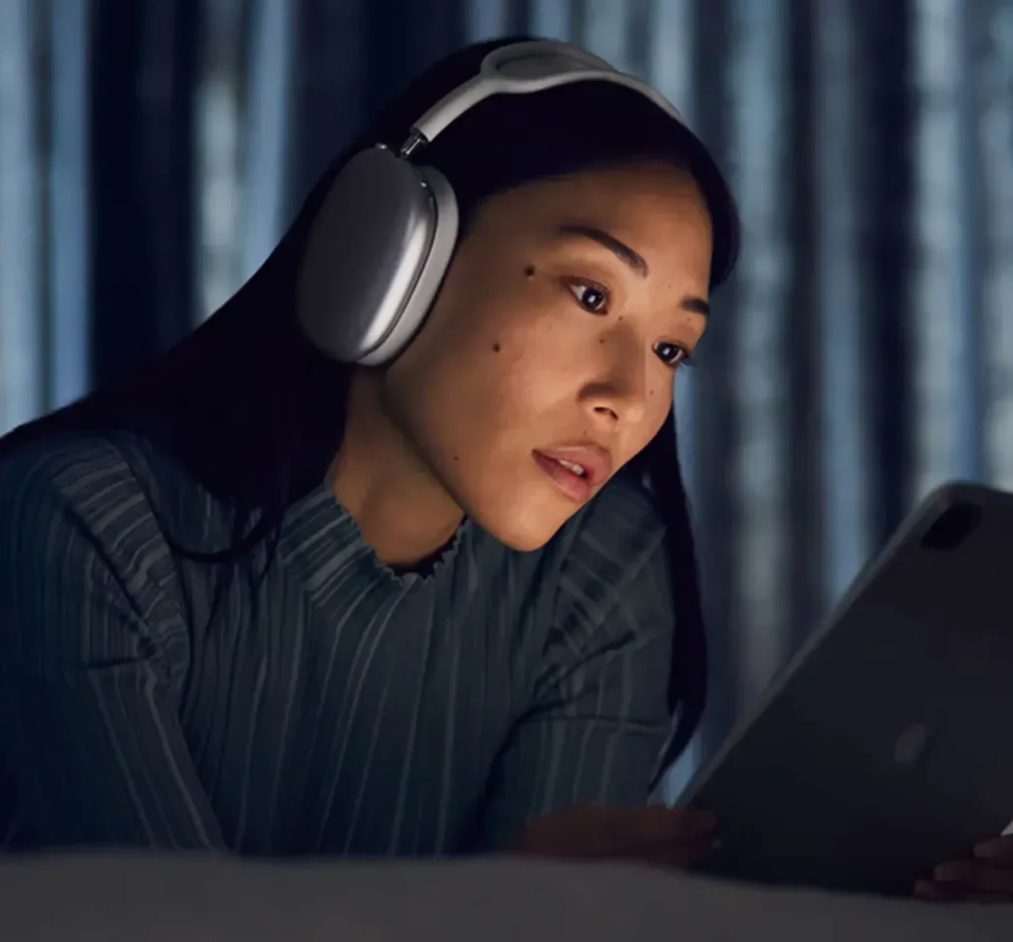 Tech imagery featuring AirPods Max