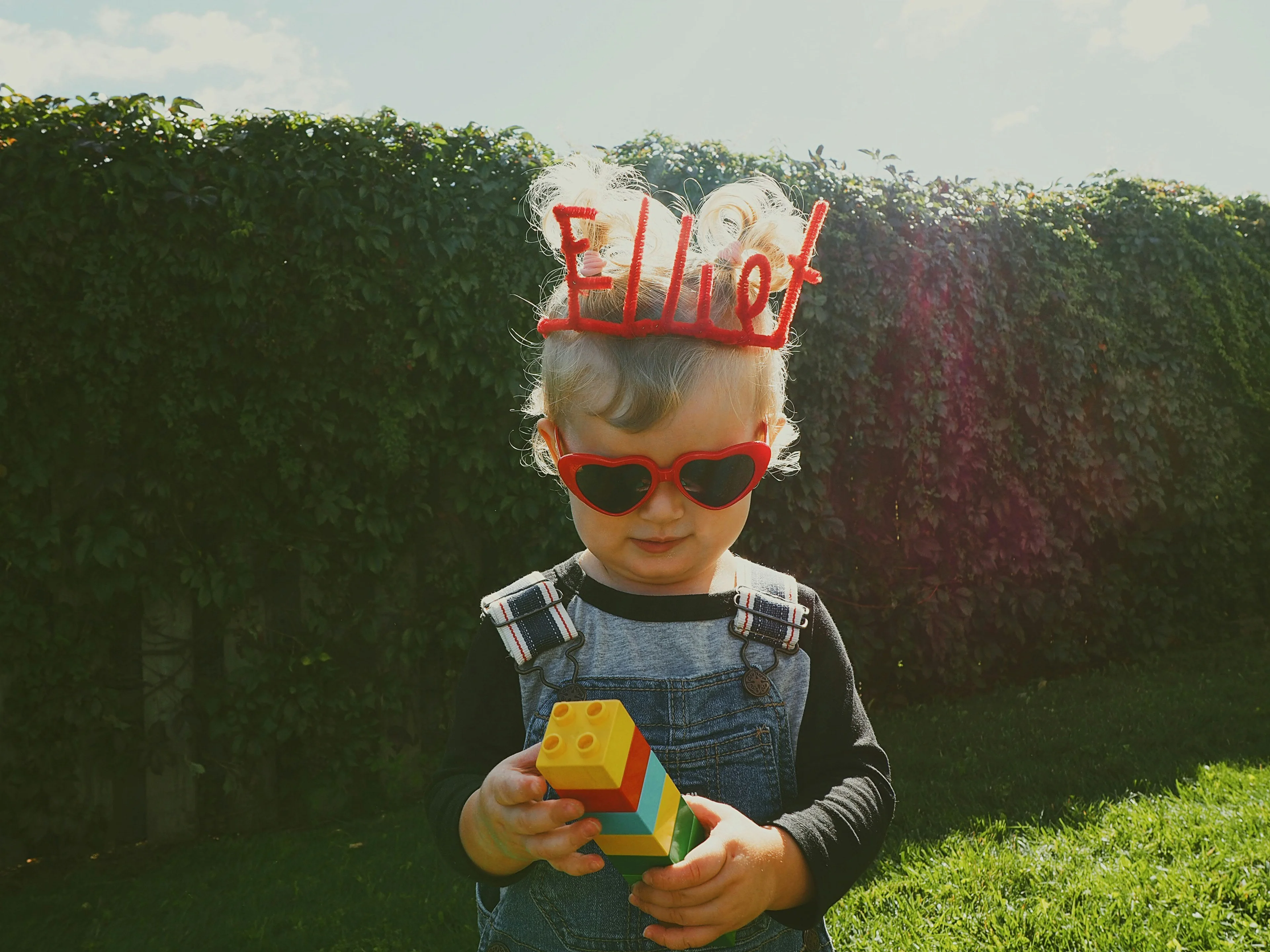 Happy child building toys