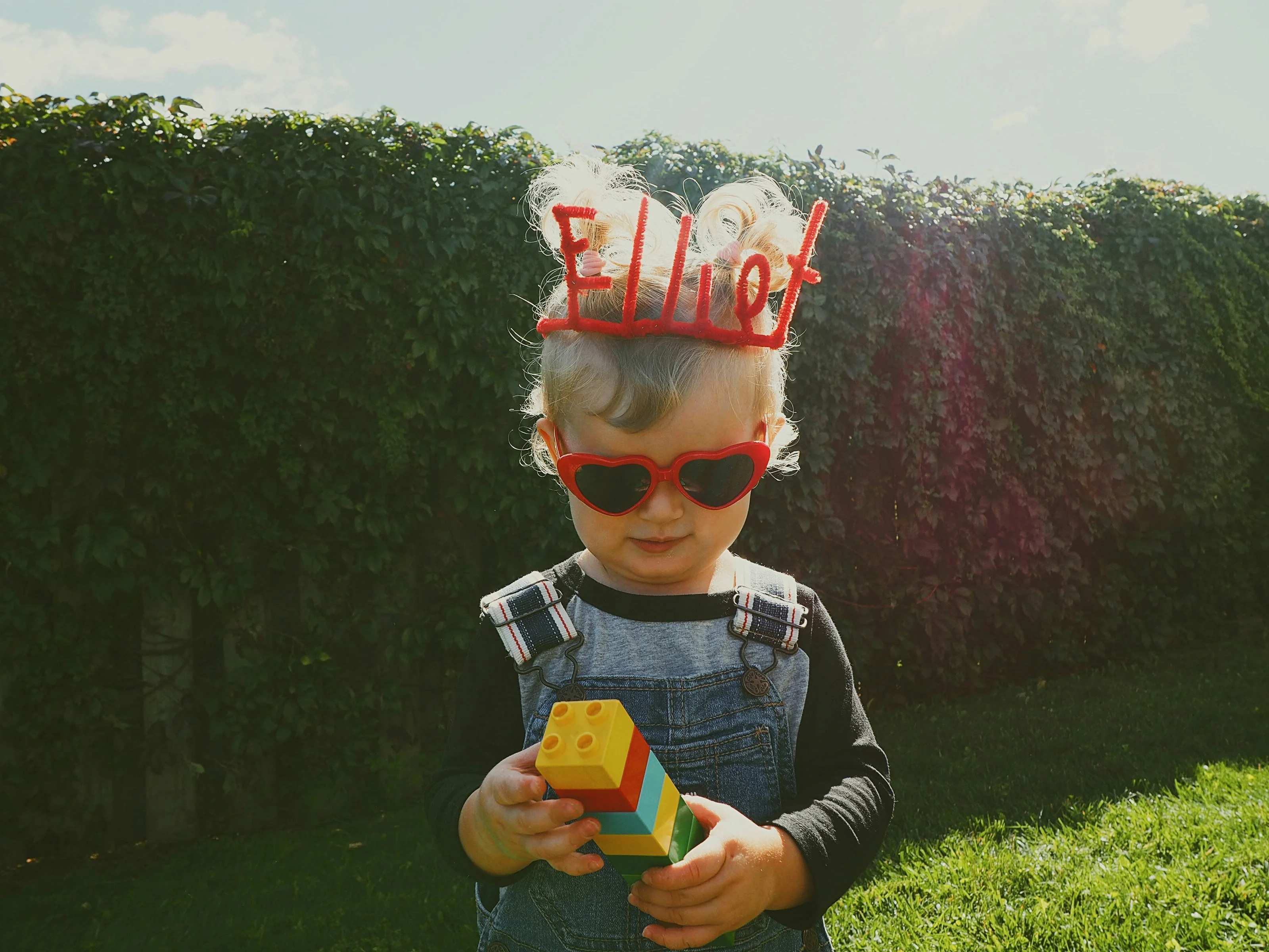 Happy child building toys