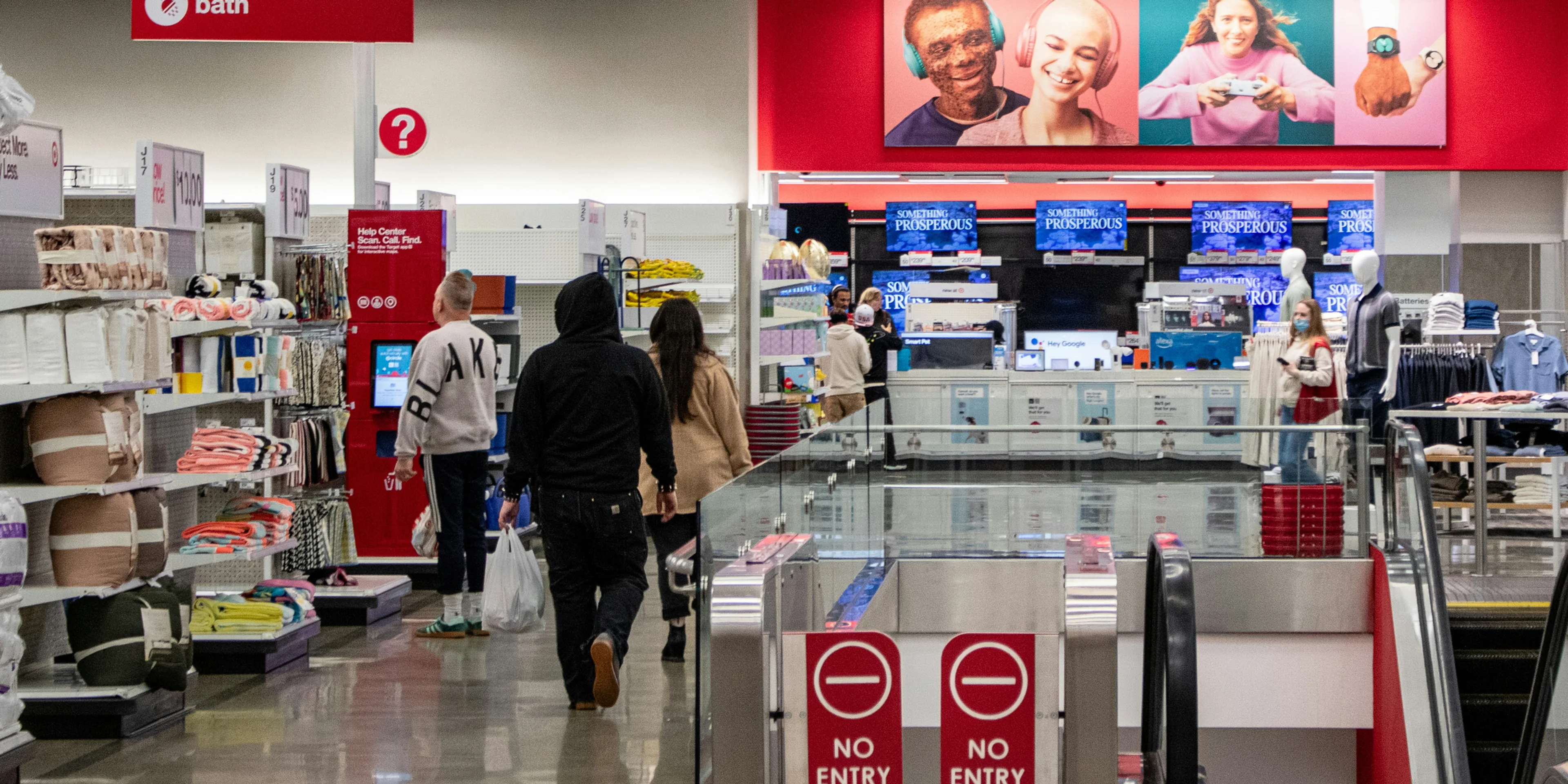 People shop in a target store aisle.
