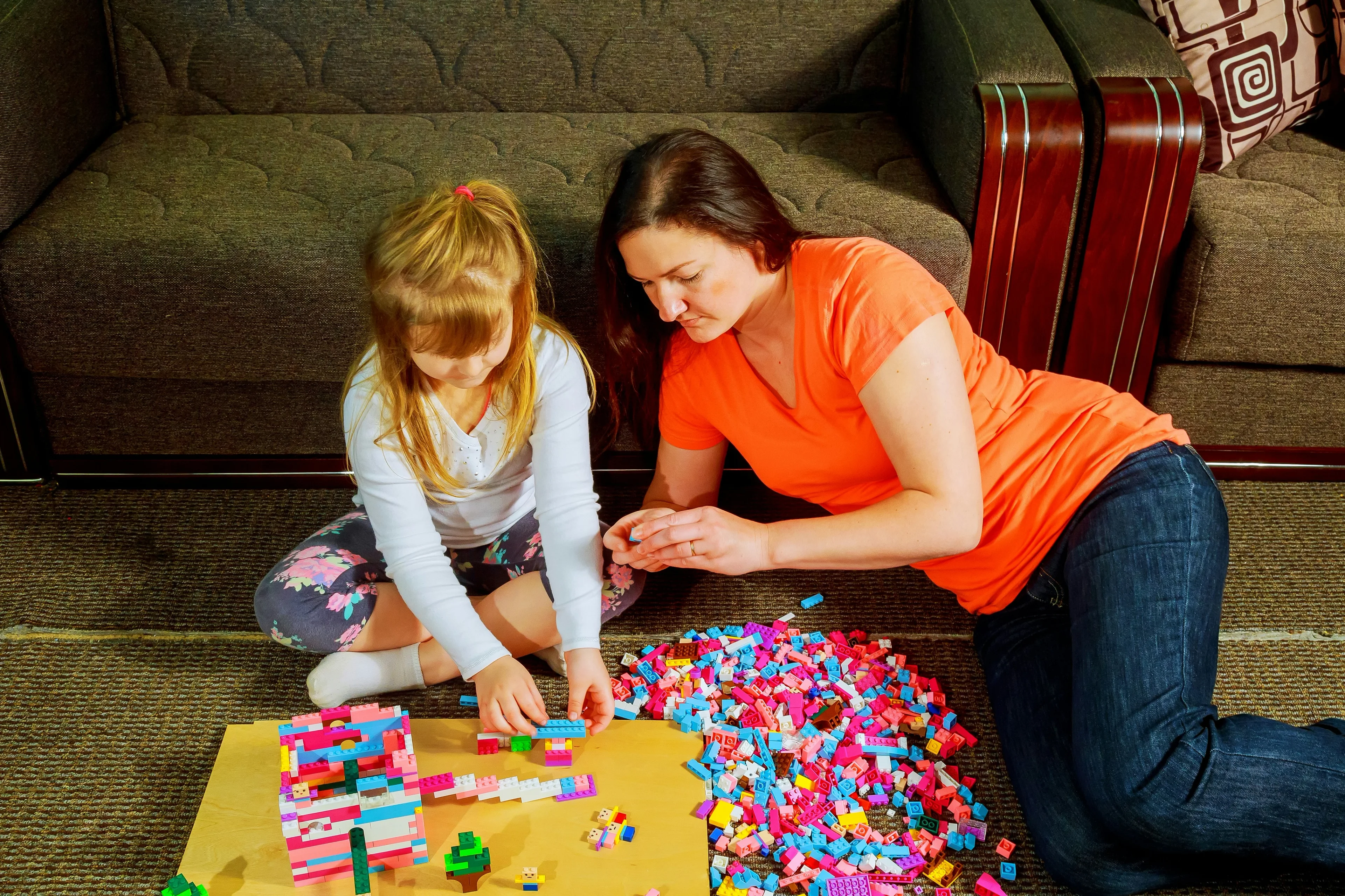 Happy family playing with toys
