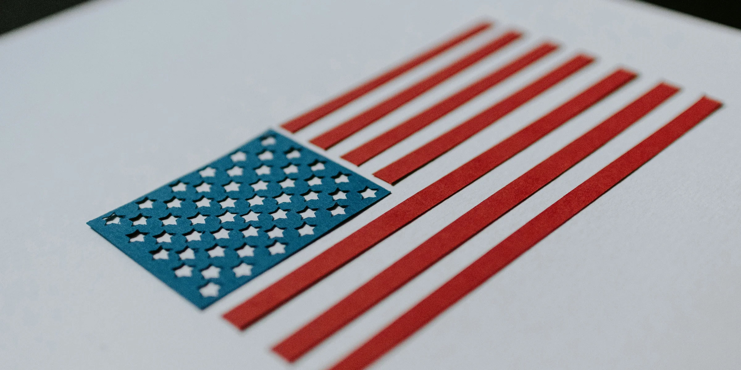a close up of an american flag on a piece of paper