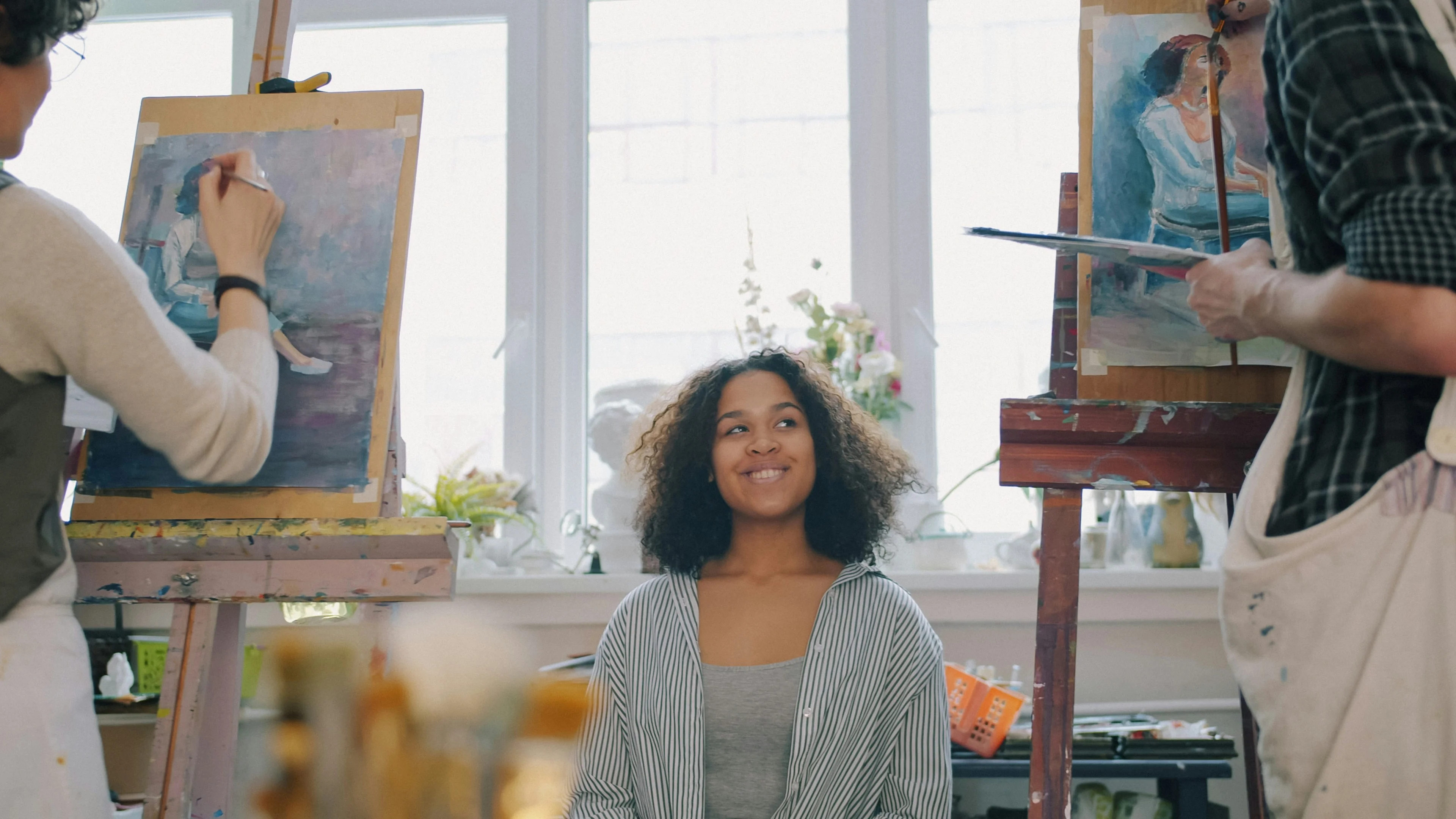 Happy person making art