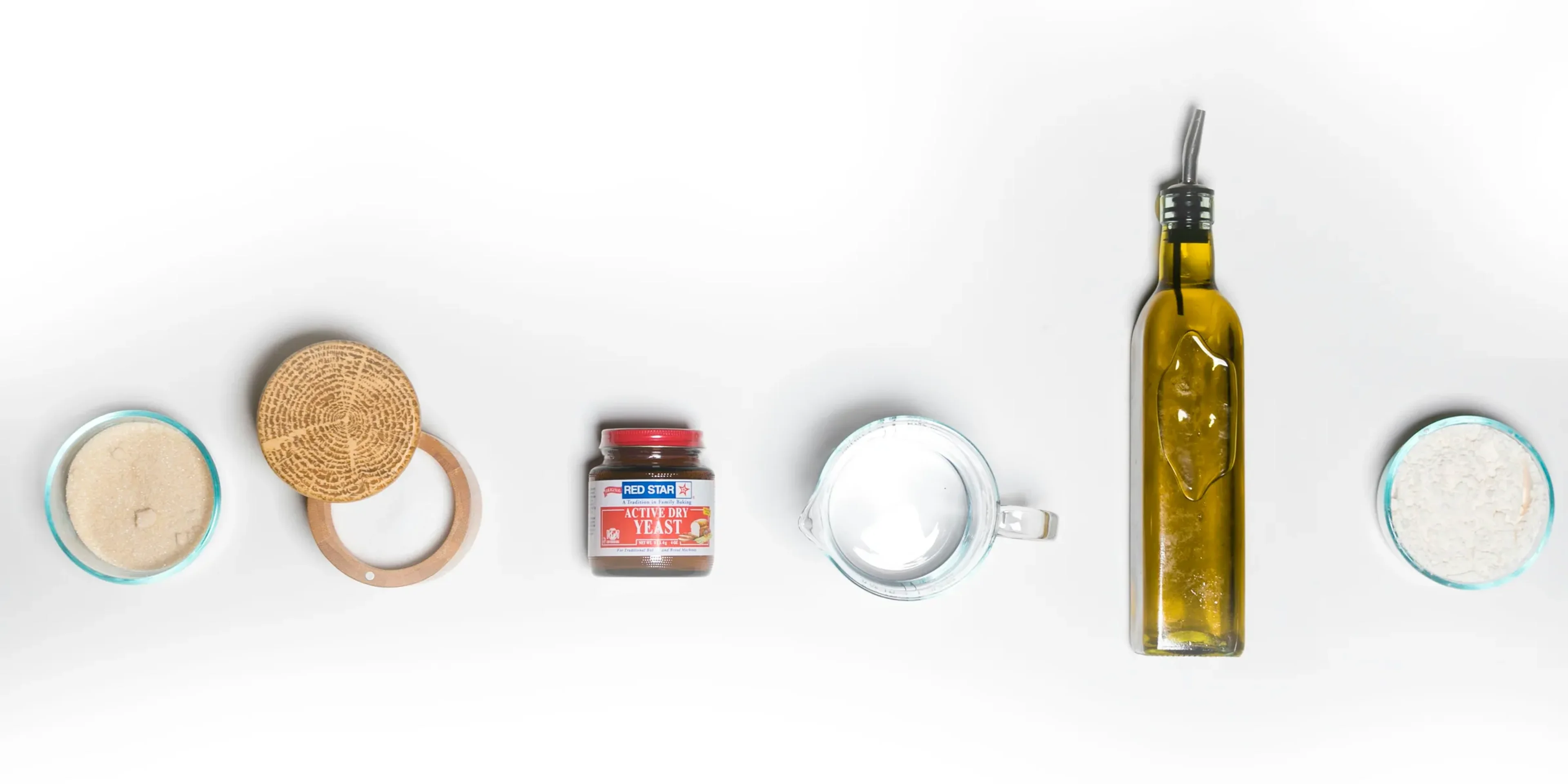 a white table topped with different types of food