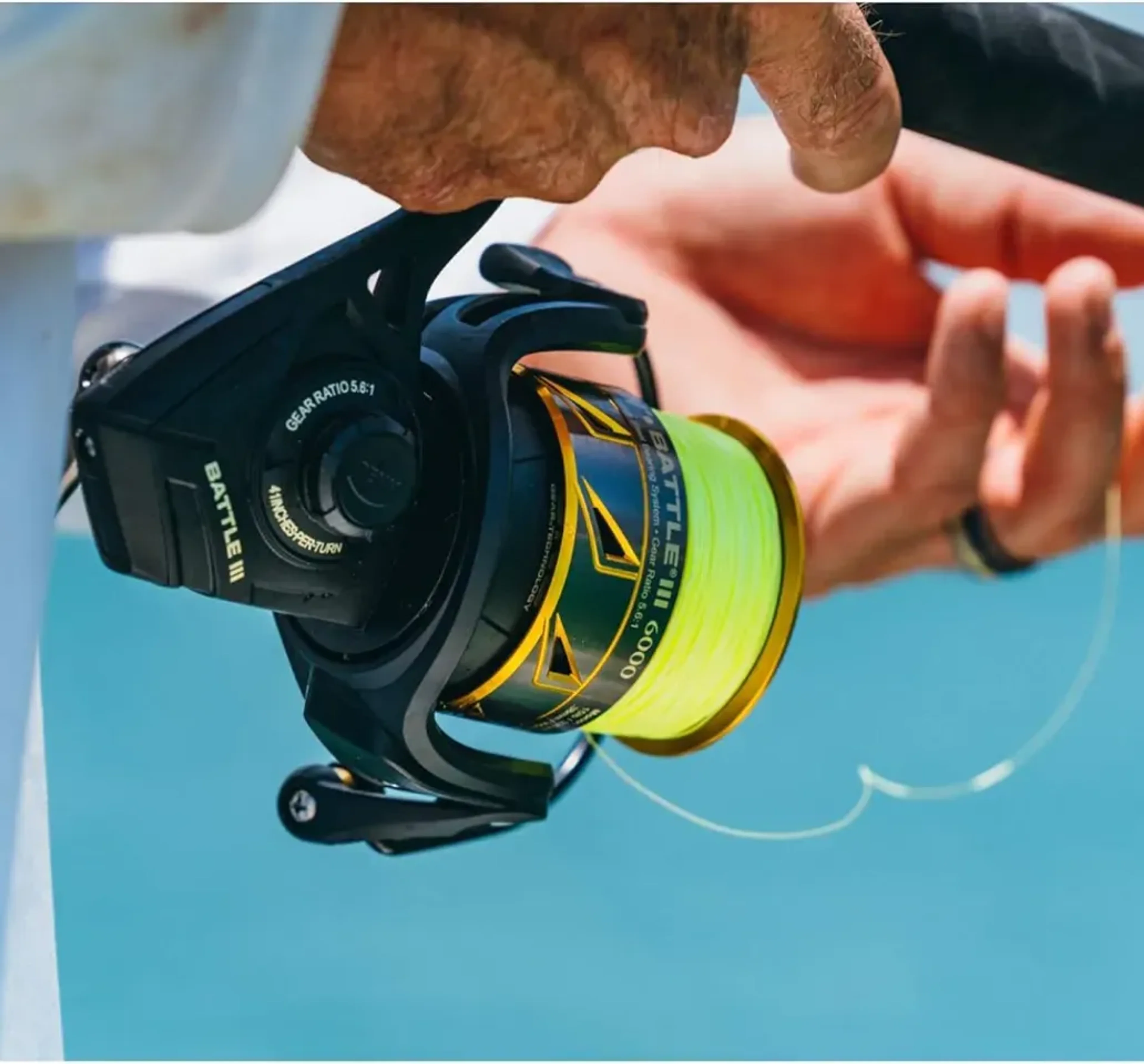 Fishing imagery featuring PENN Battle III Spinning Reel