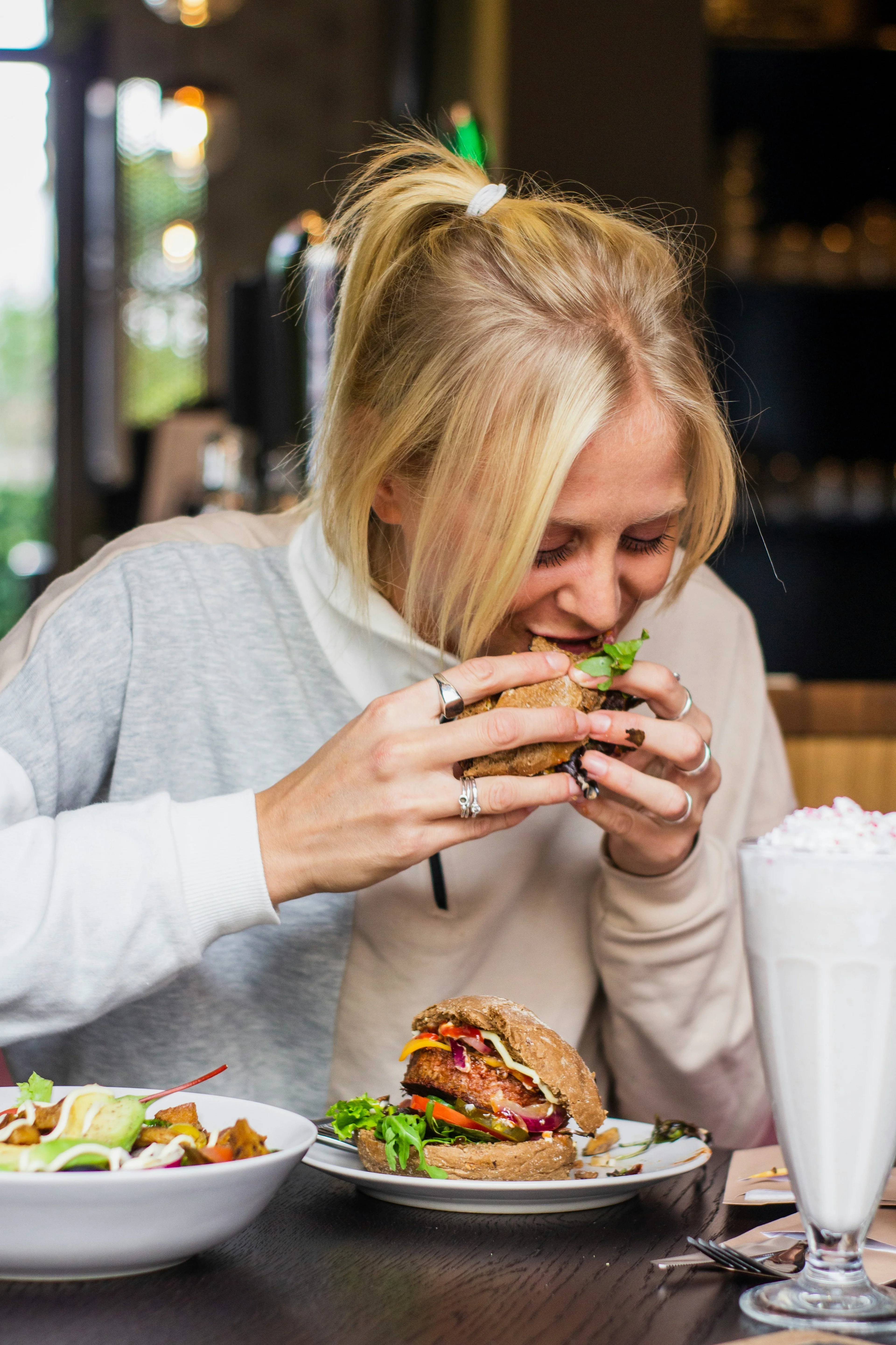 person eating sandwich