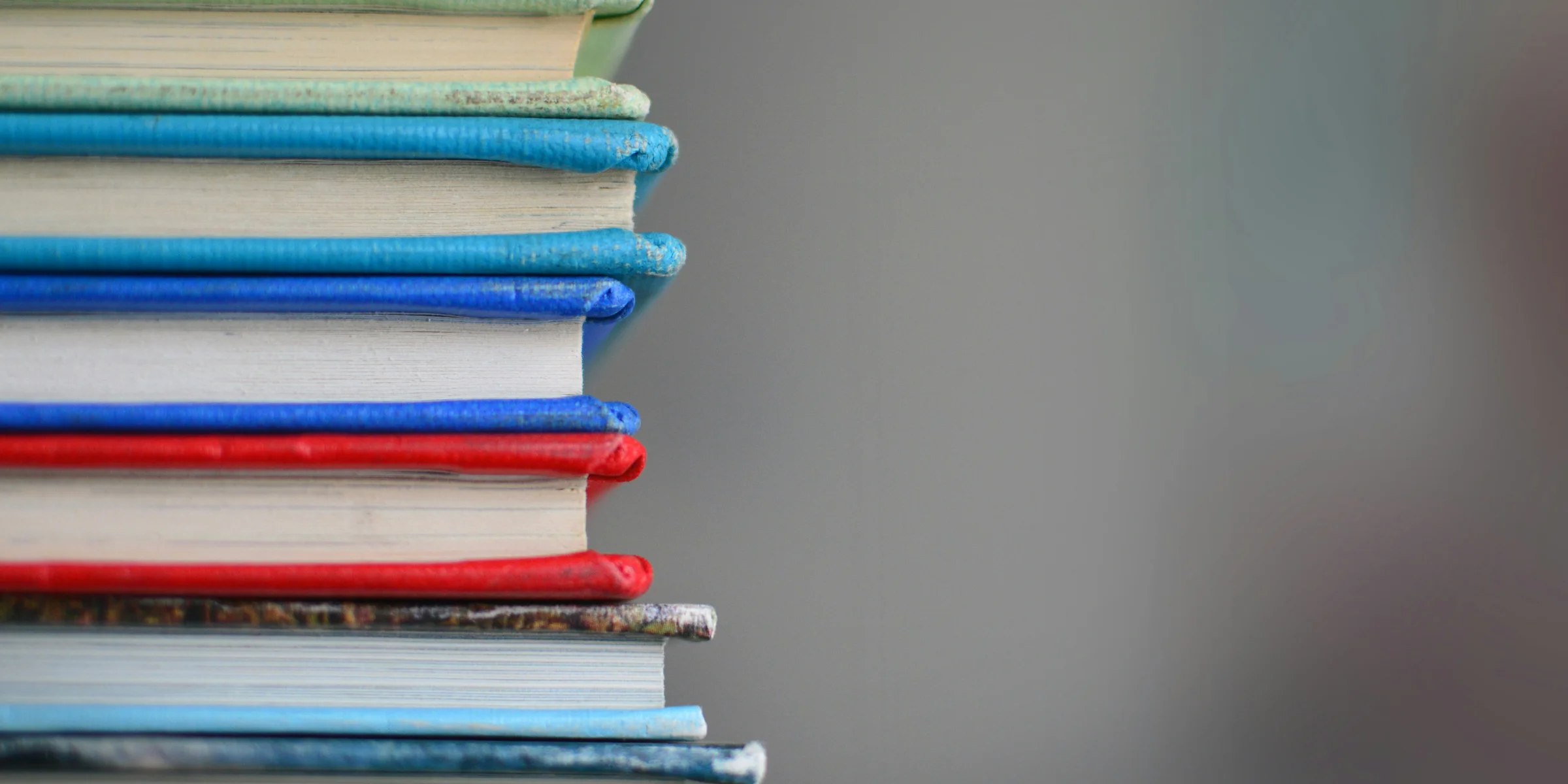 shallow focus photography of books.