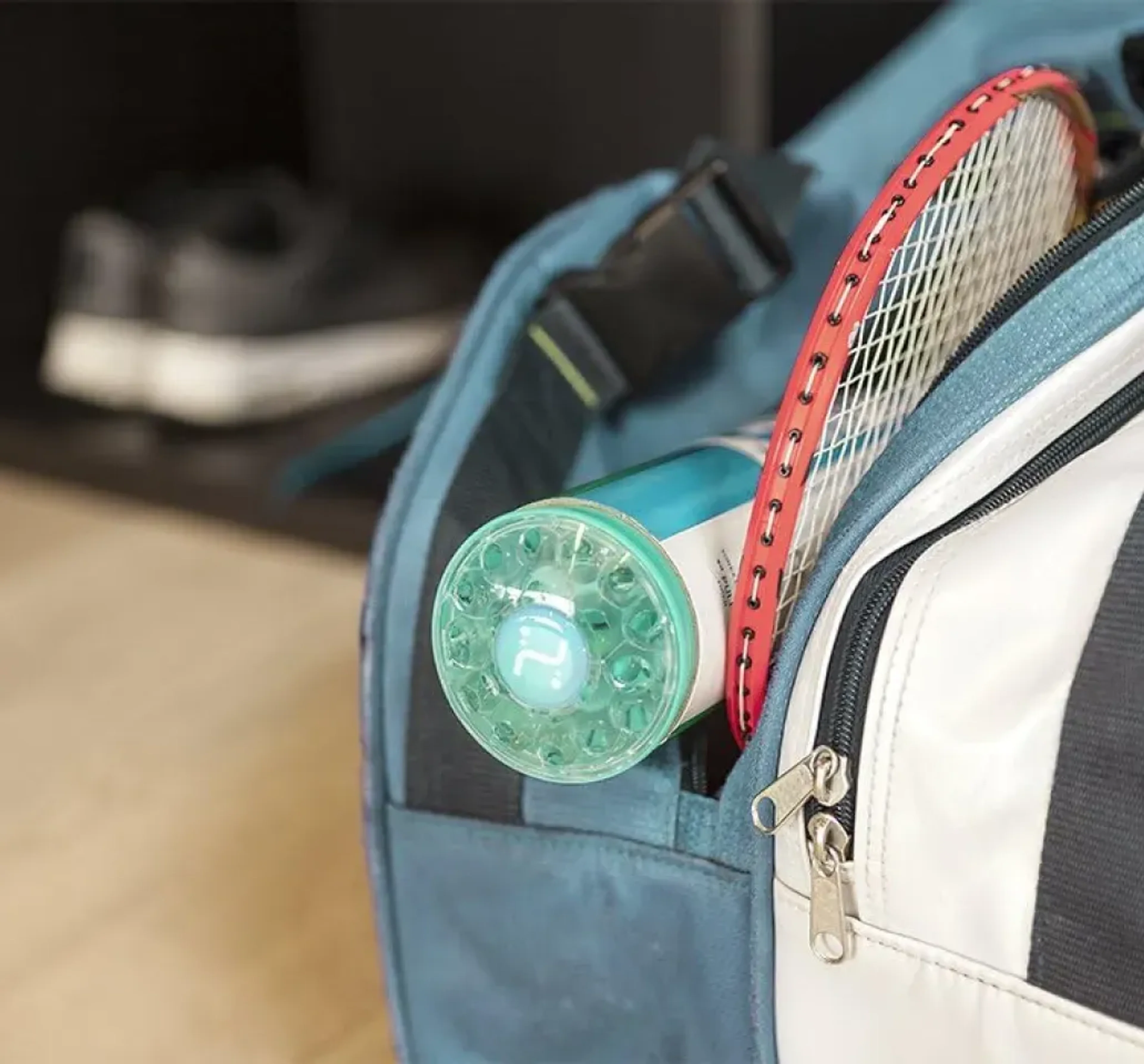 Badminton imagery featuring Humidome Shuttlecock Humidifier
