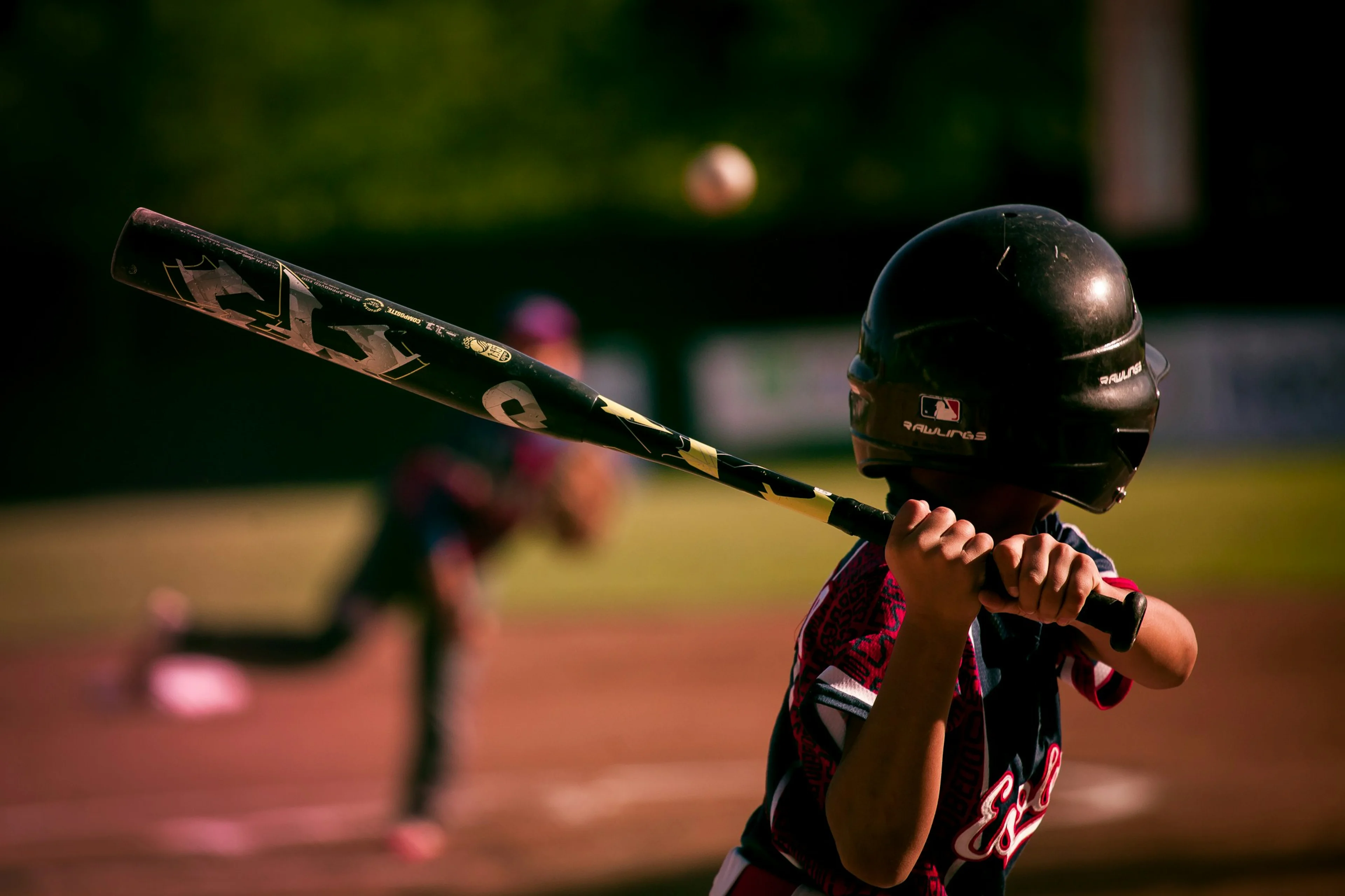 Baseball bat and ball