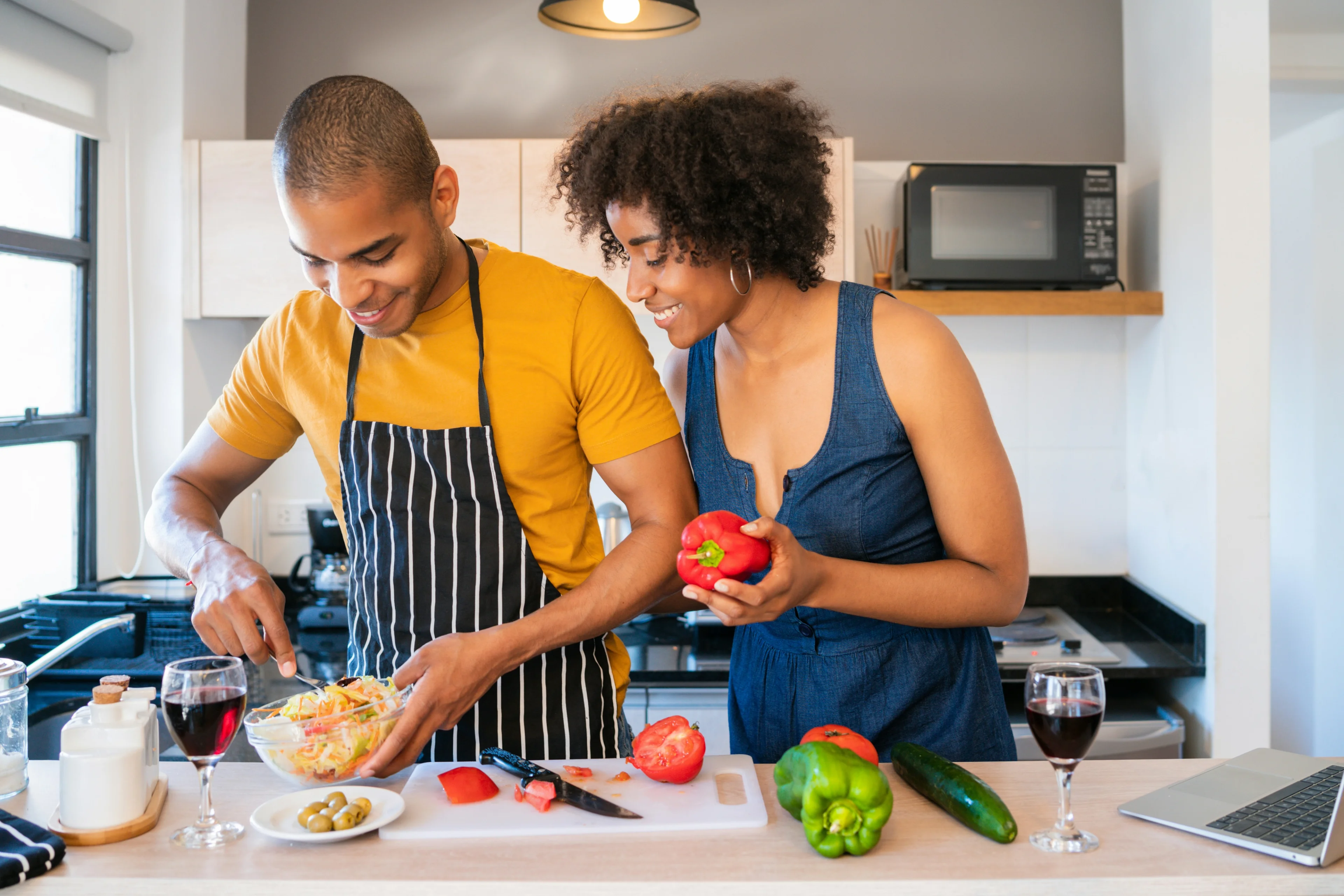 Happy people cooking together