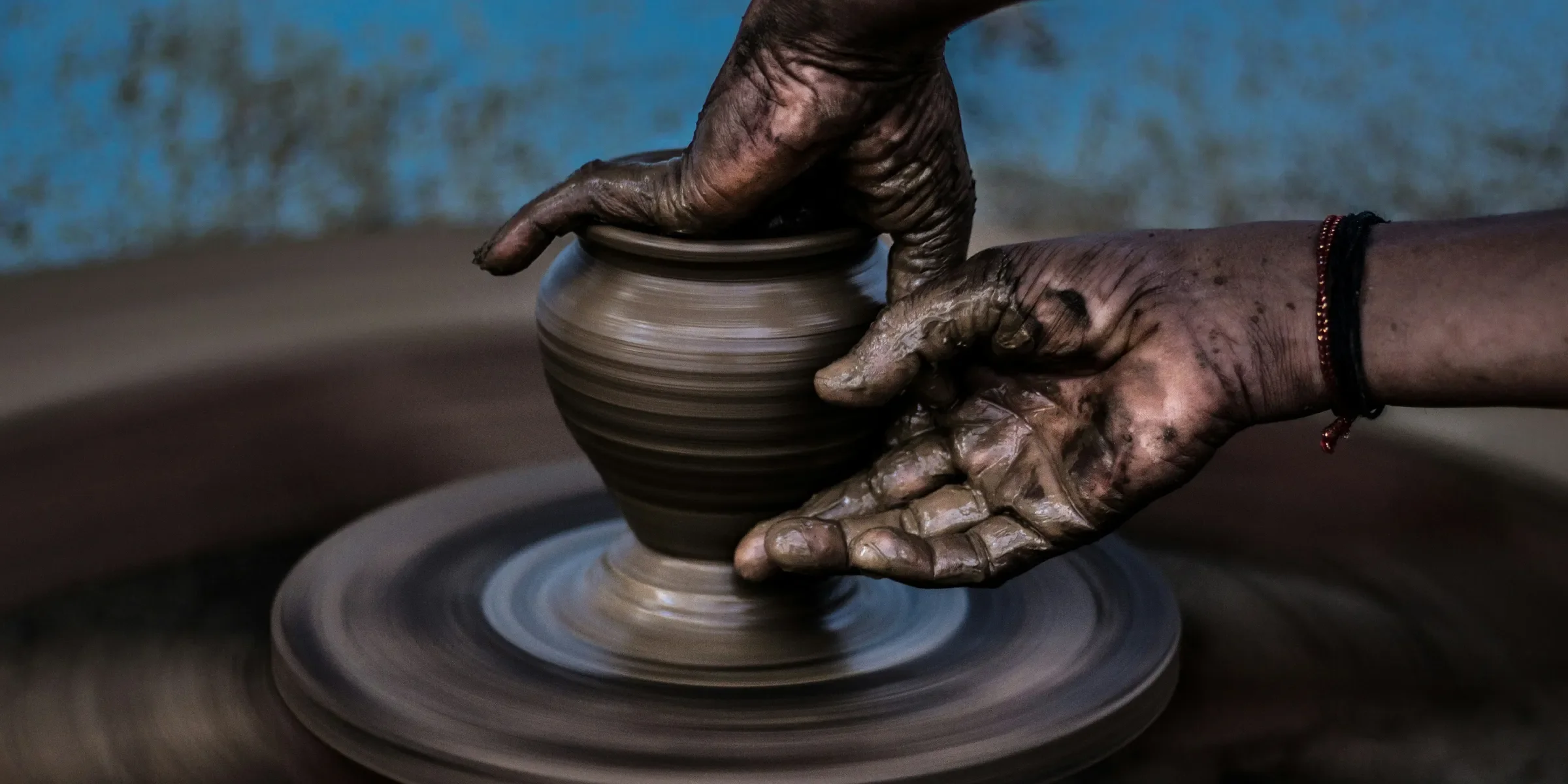person molding vase