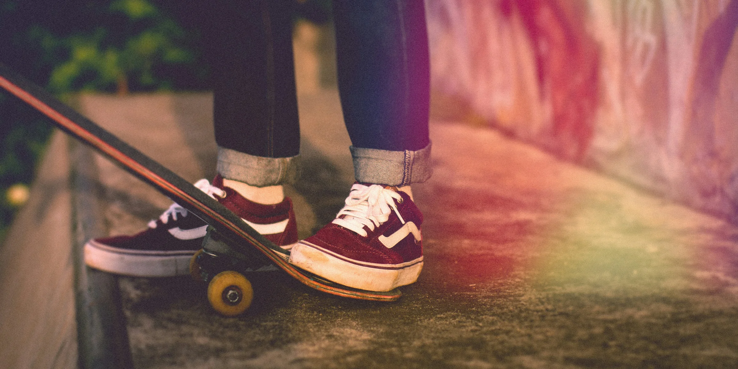 person standing beside skateboard