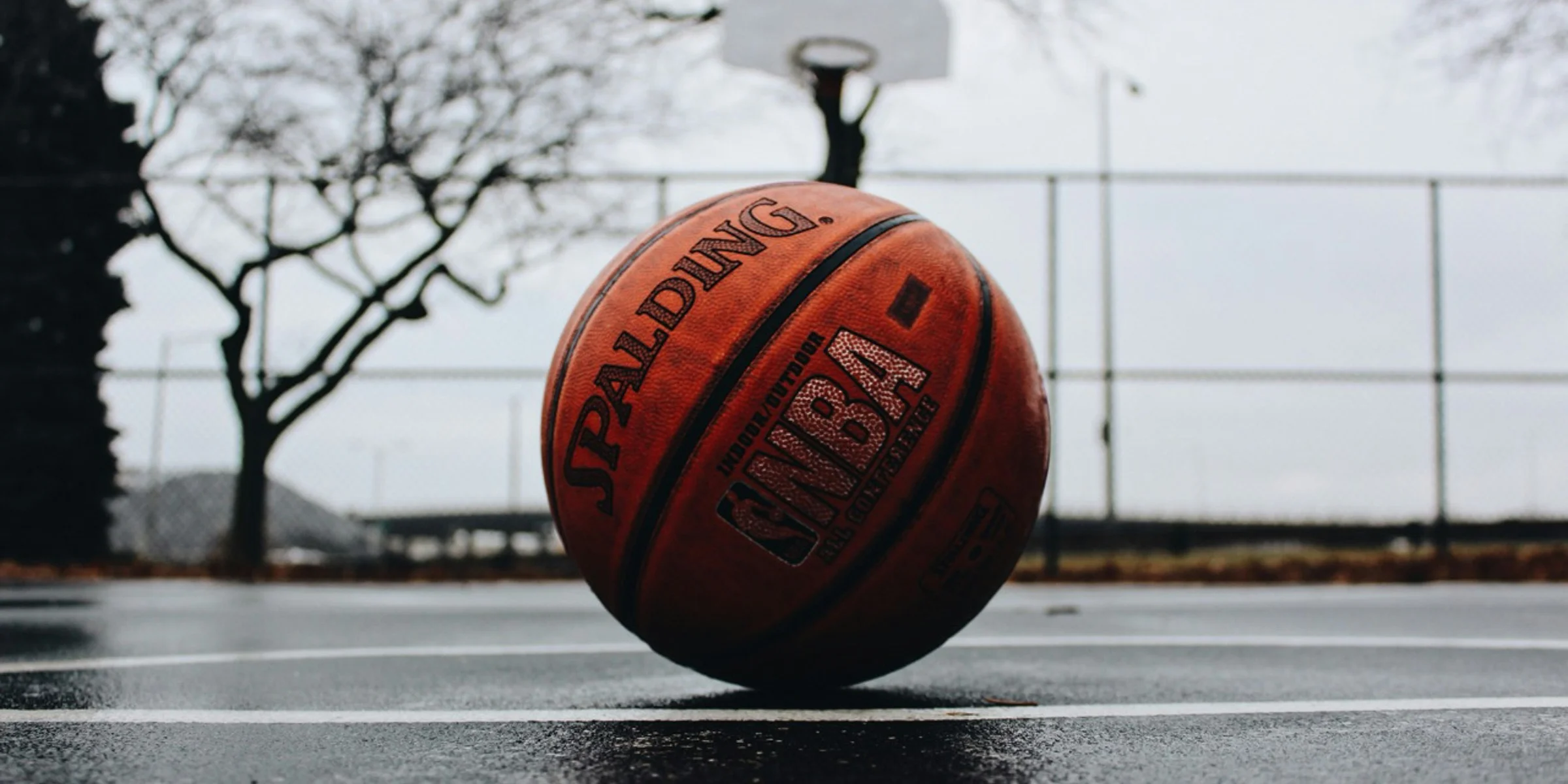 Spalding basketball in court