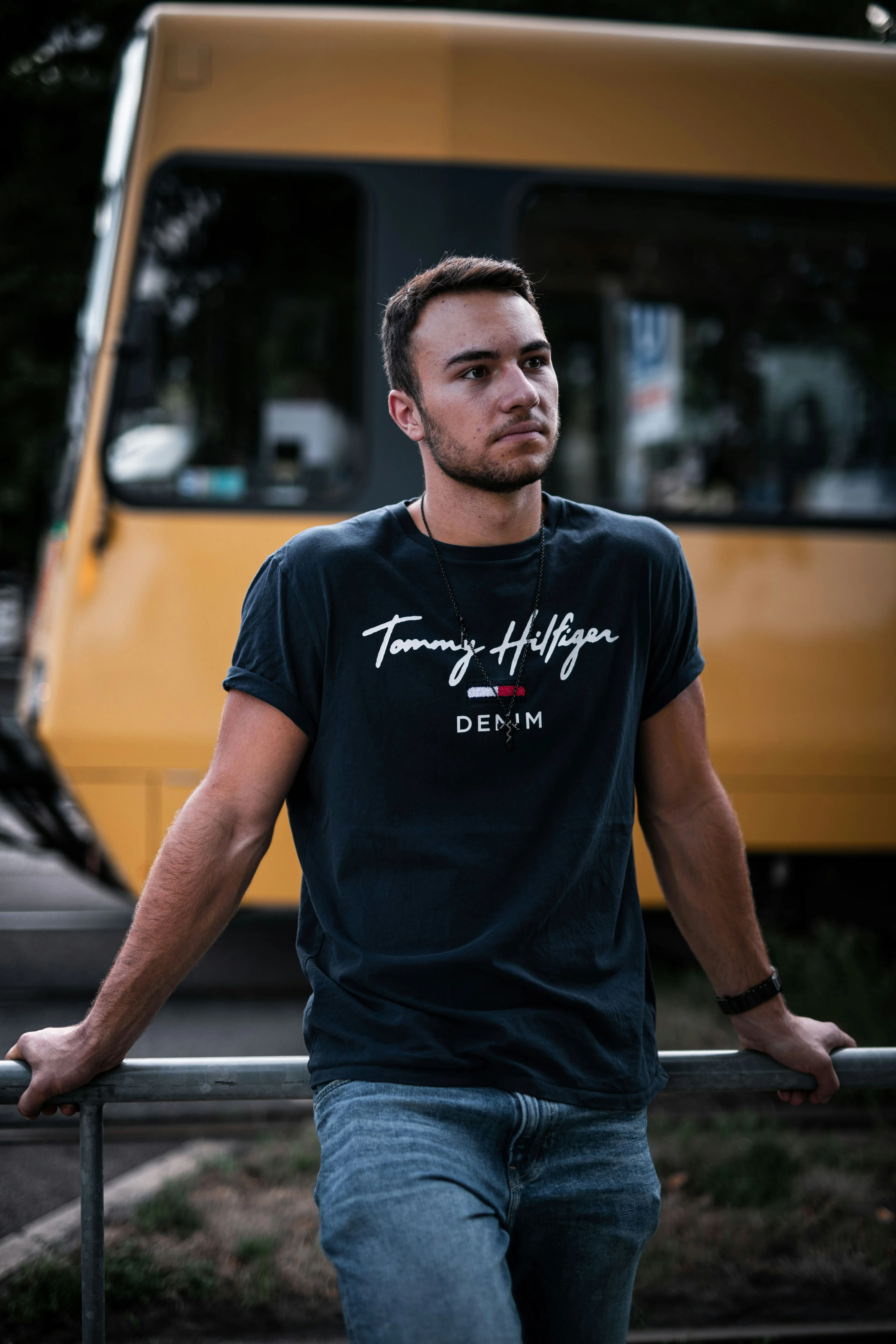 man wearing a tommy hilfiger shirt