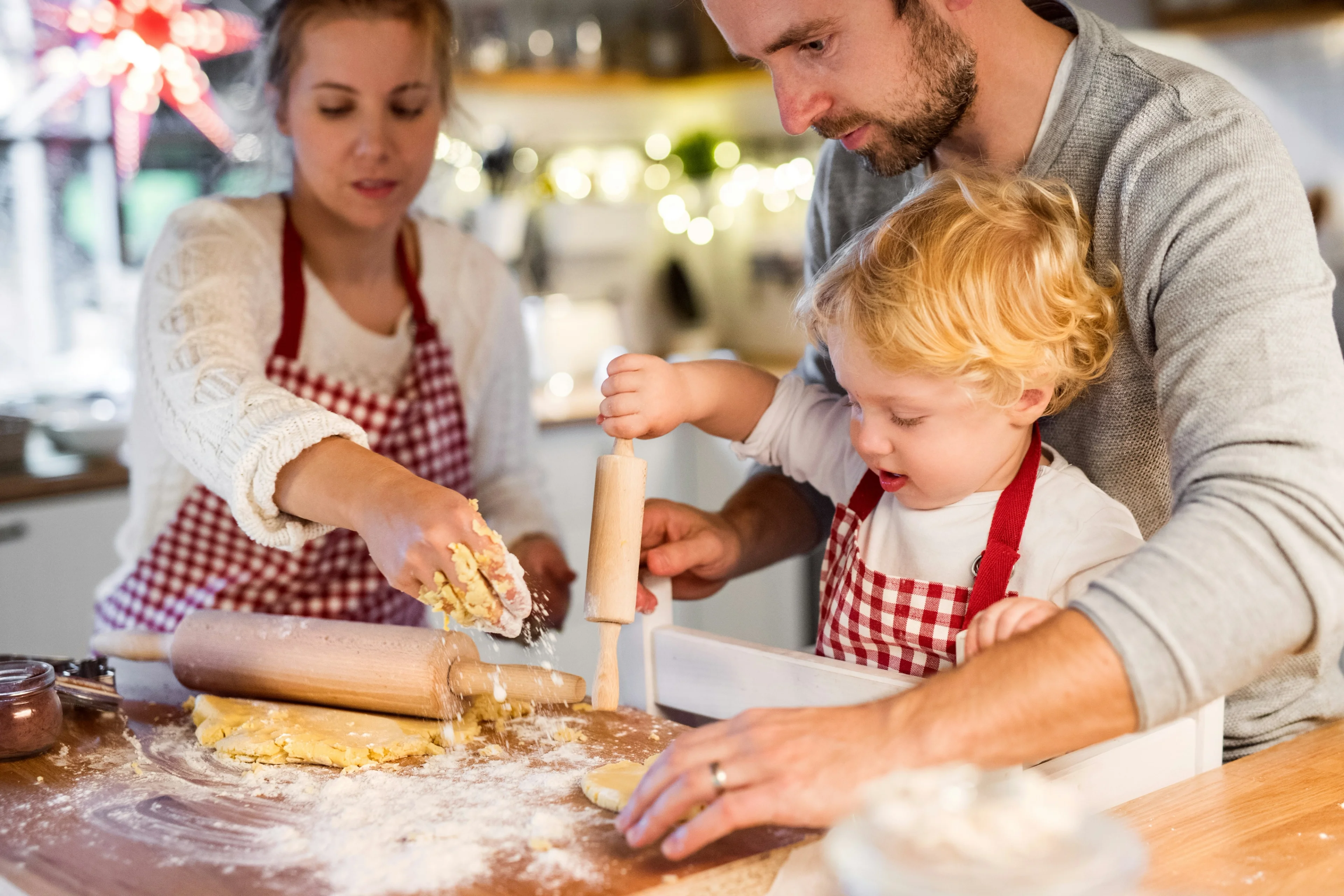 Happy baker in kitchen