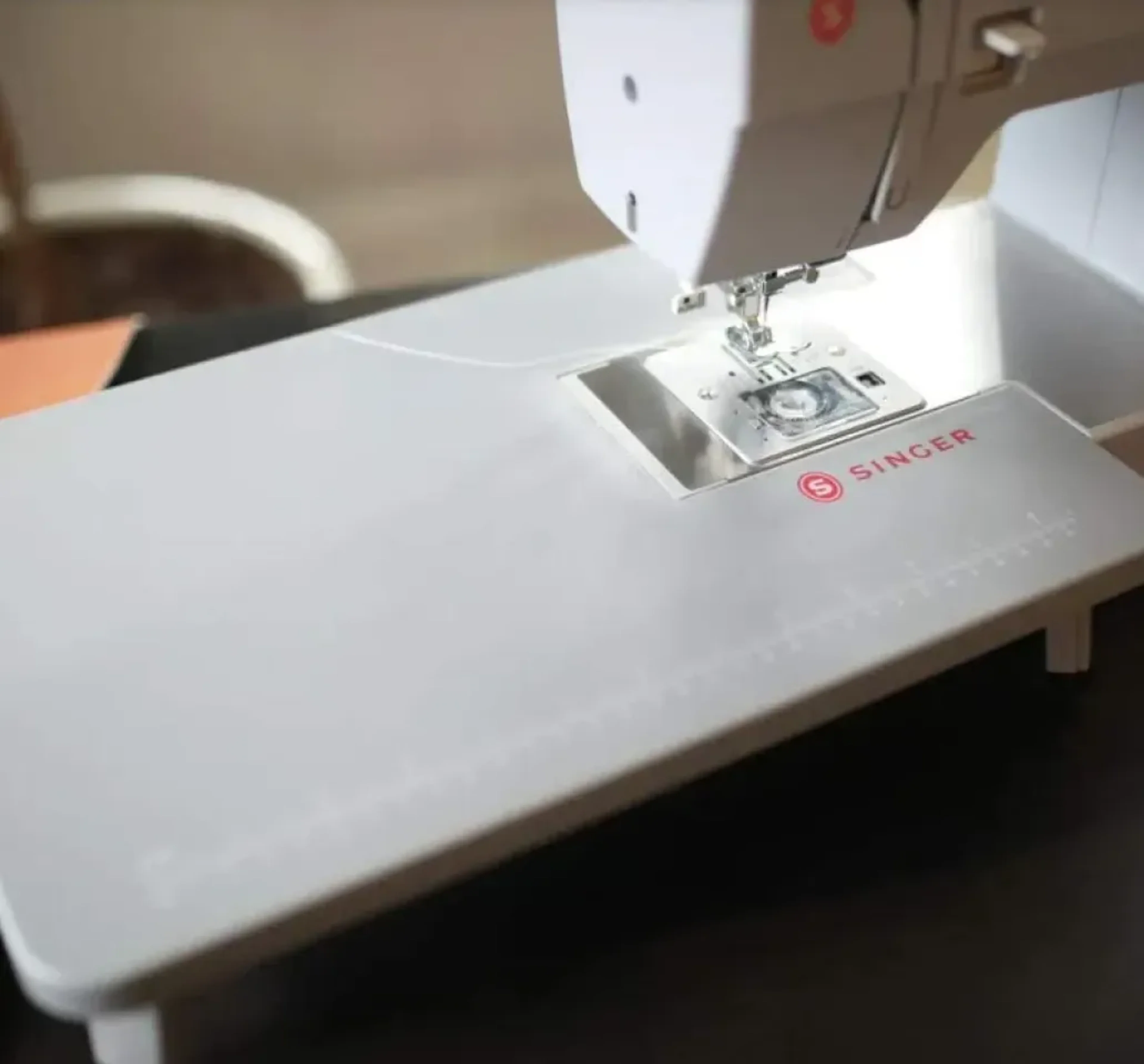 Sewing imagery featuring Singer Extension Table