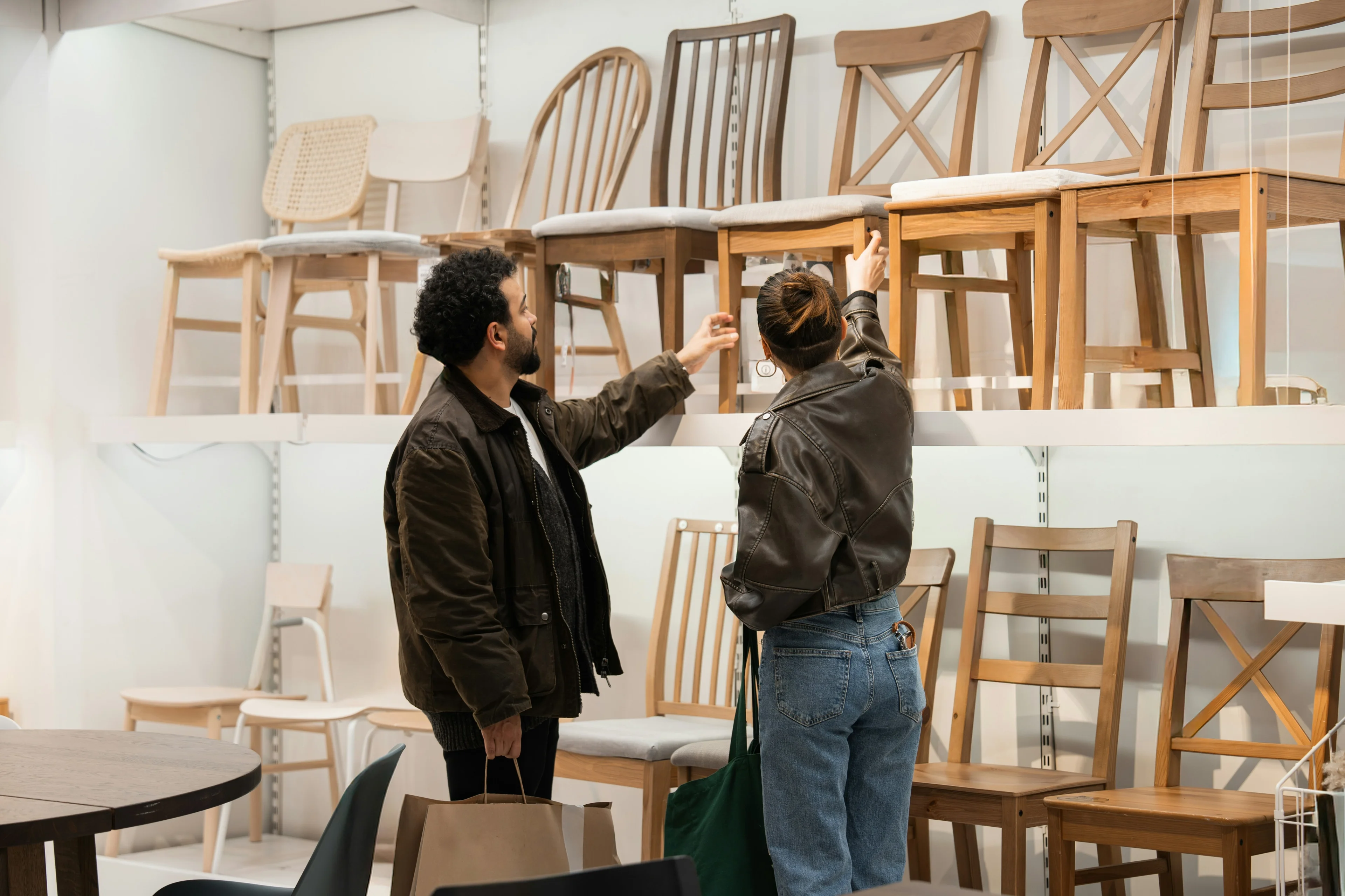 people at a furniture store