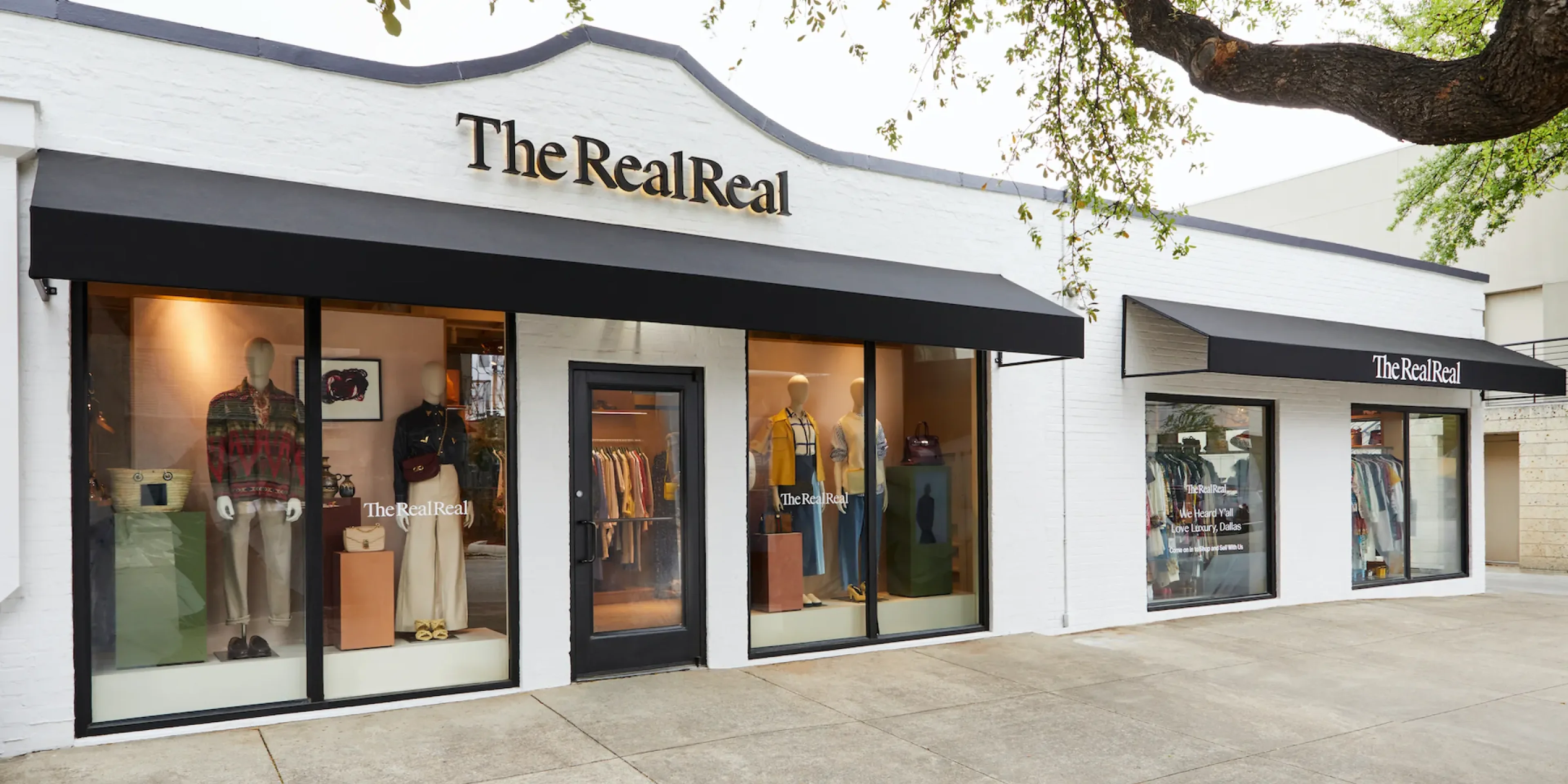 exterior of a building with The RealReal signage