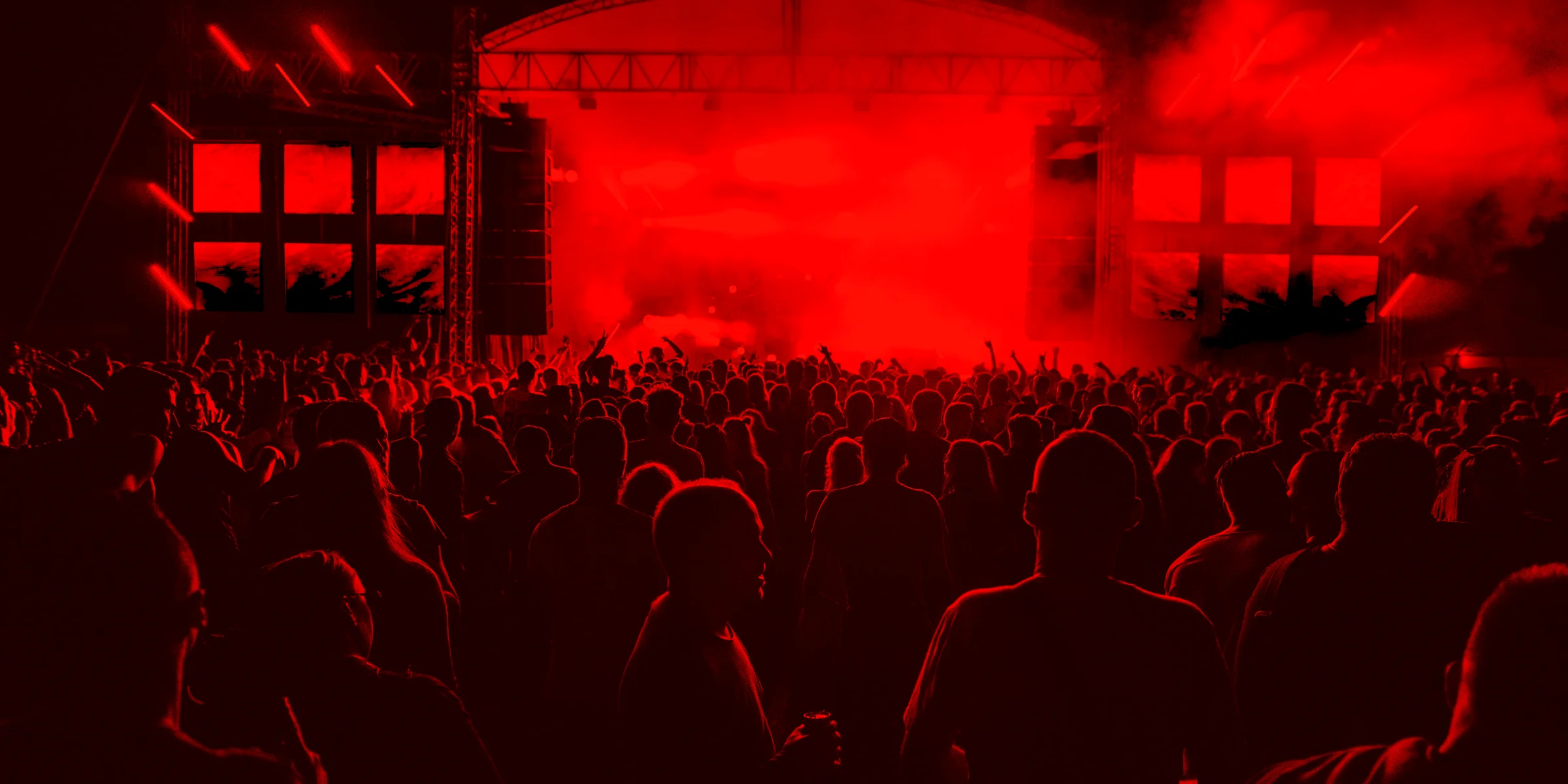 people inside concert ground at night.