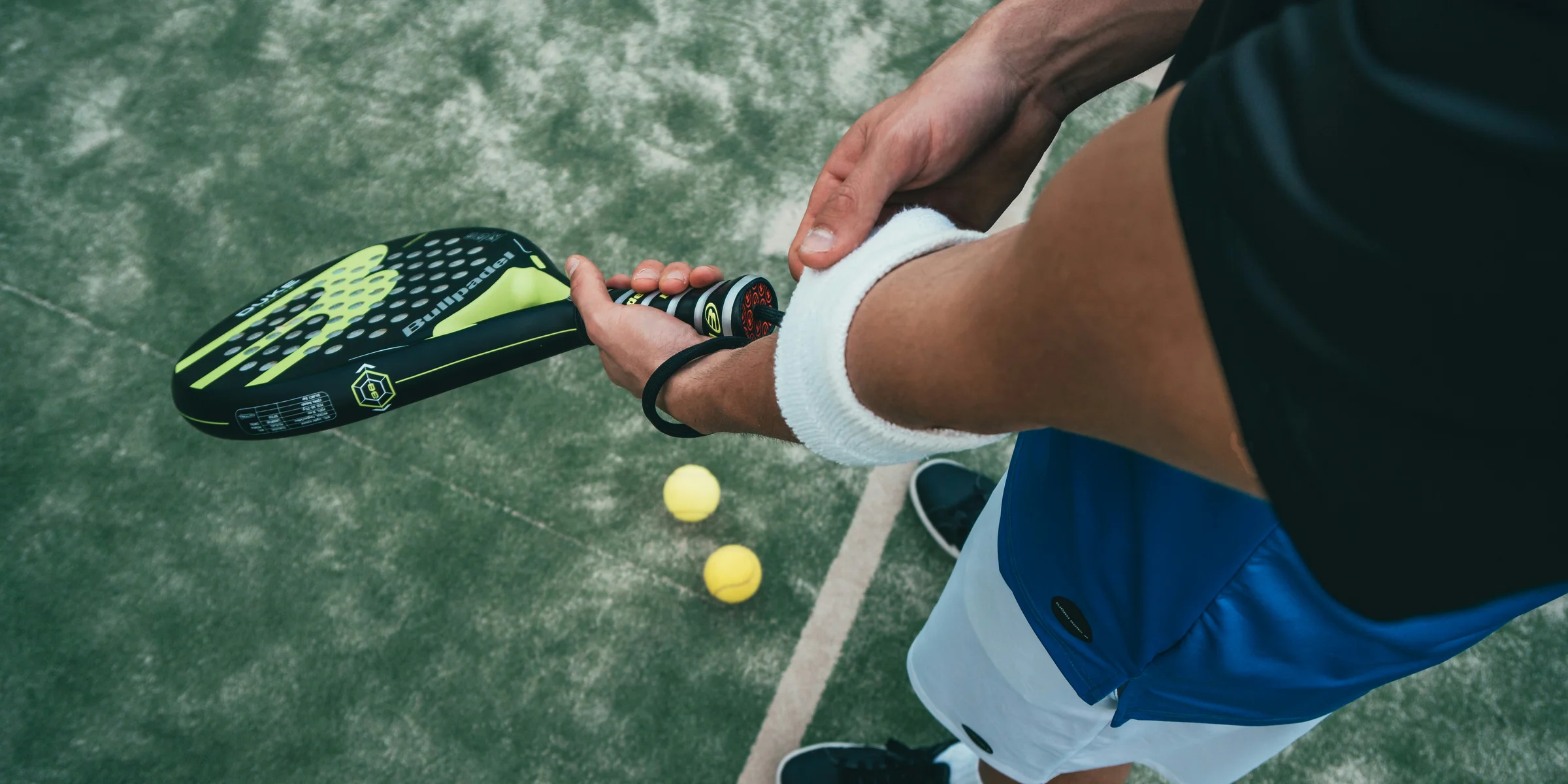 person holding tennis racket