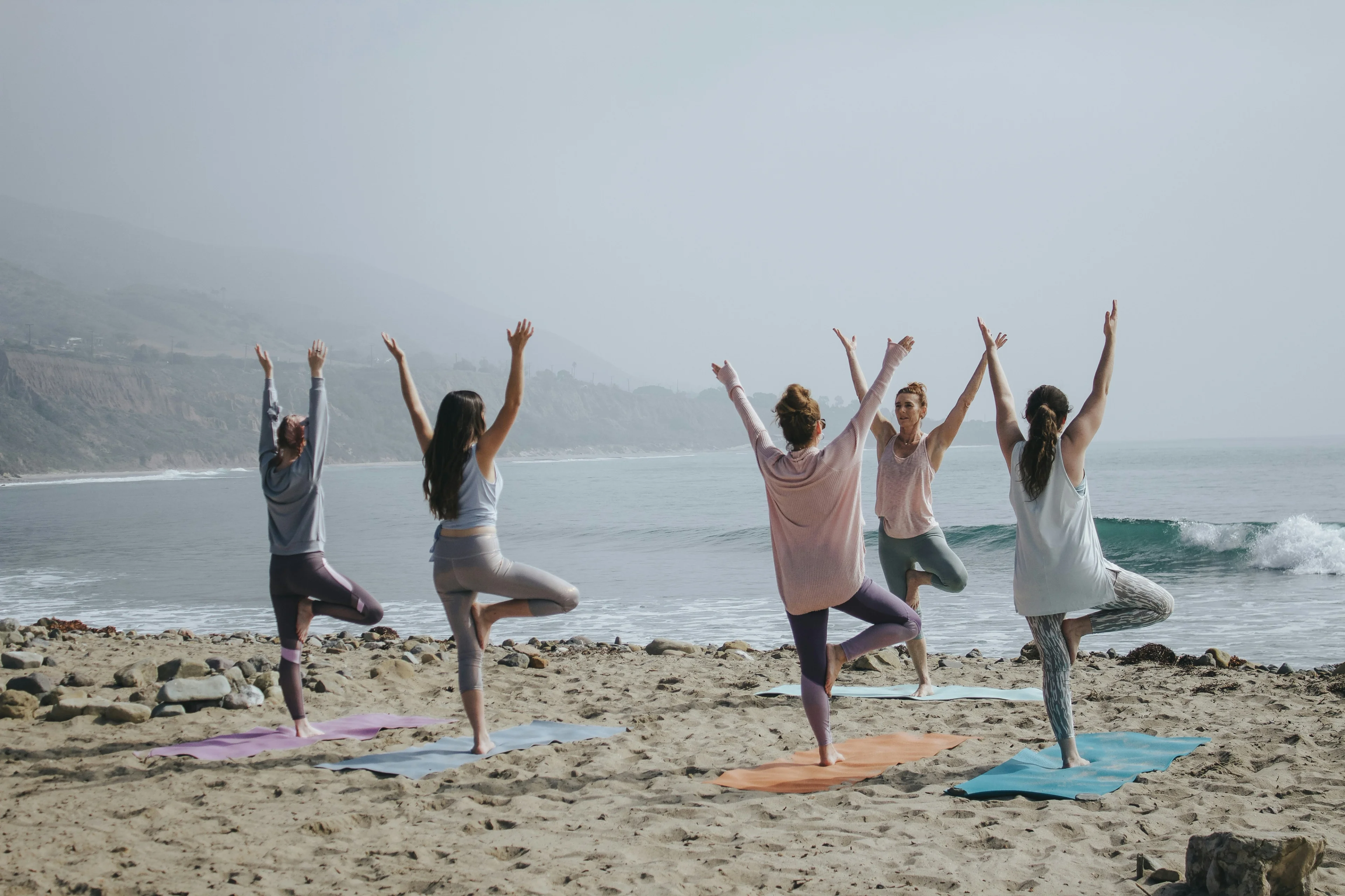 Person doing yoga outdoors