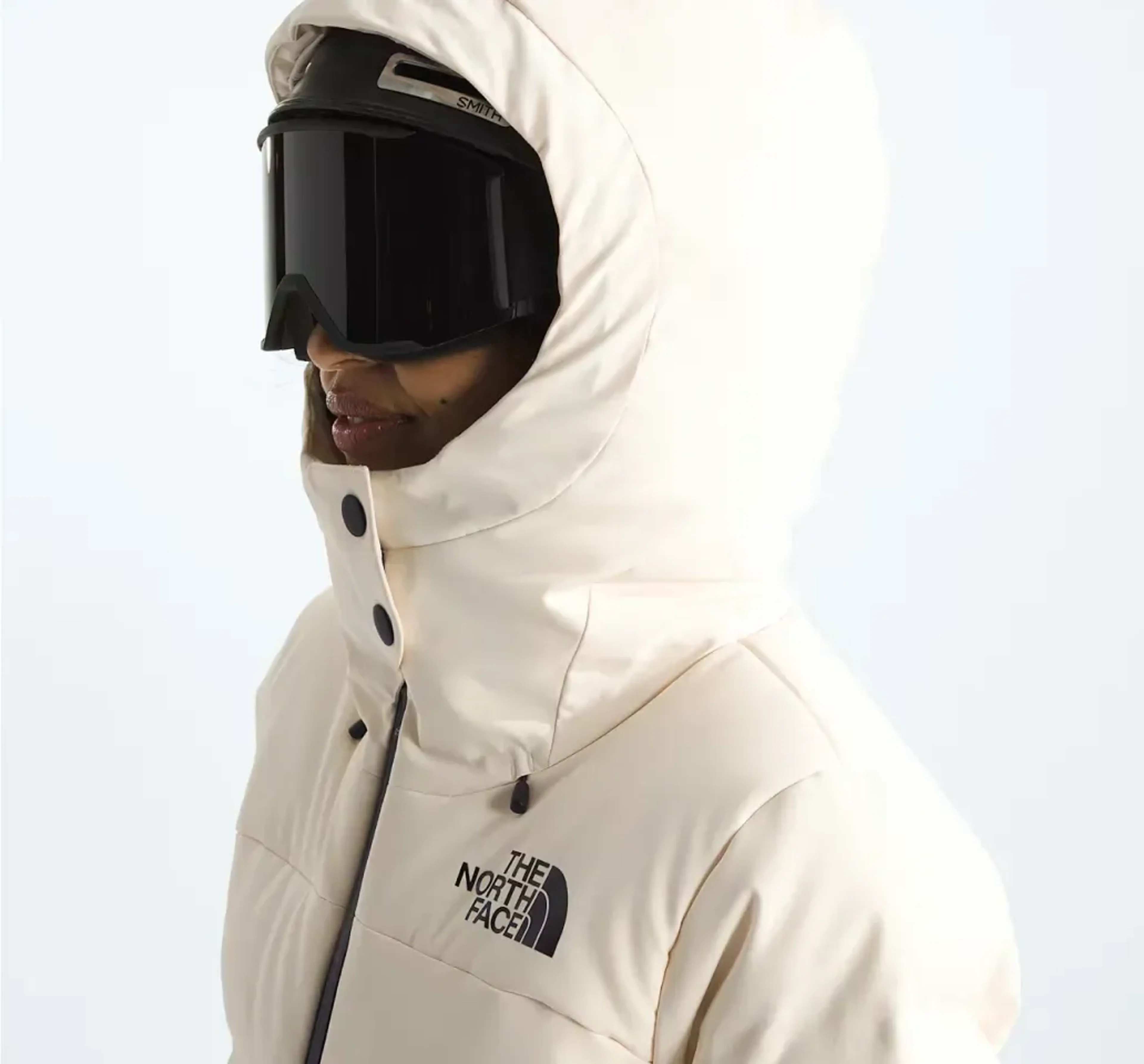 Winter sports imagery featuring Women’s Cirque Down Jacket