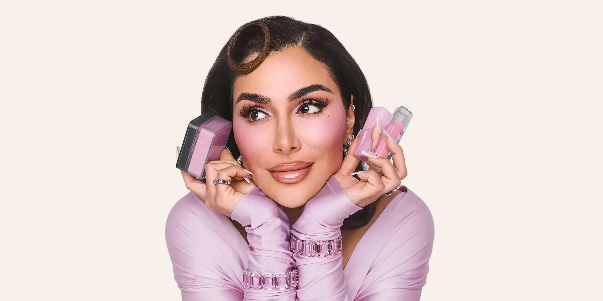 person smiling holding beauty products