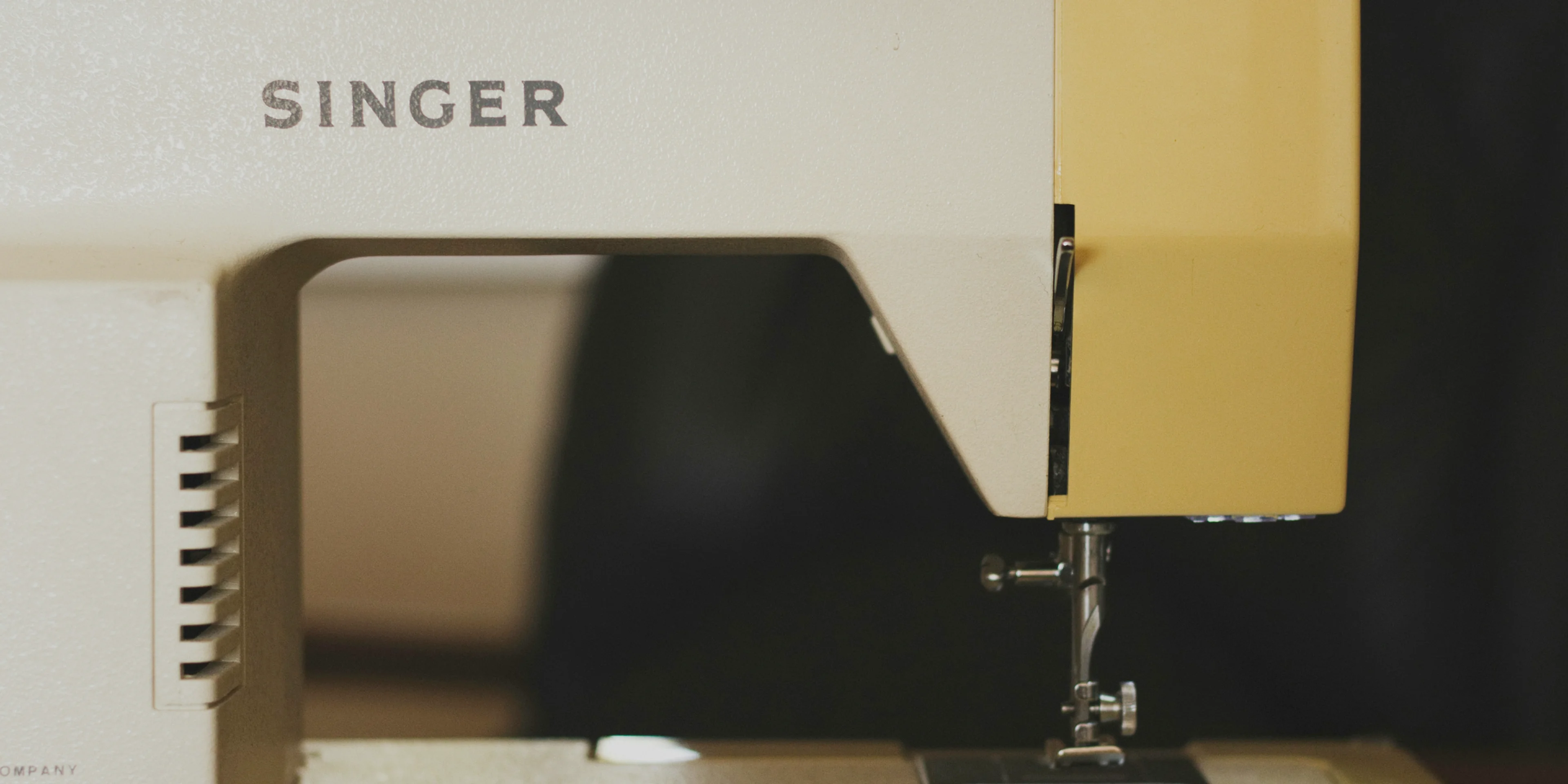 white Singer sewing machine.