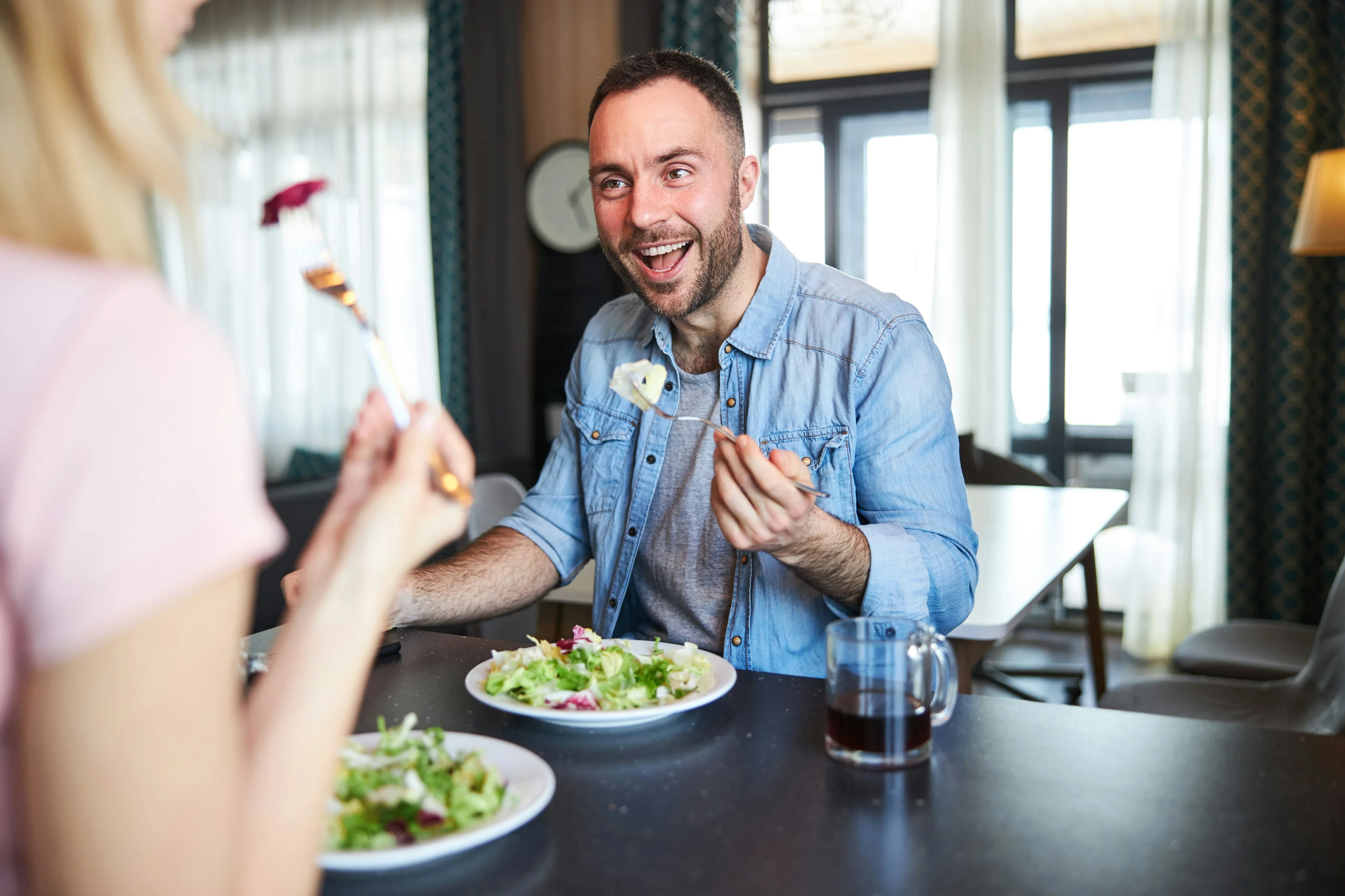 Friends sharing food at a table