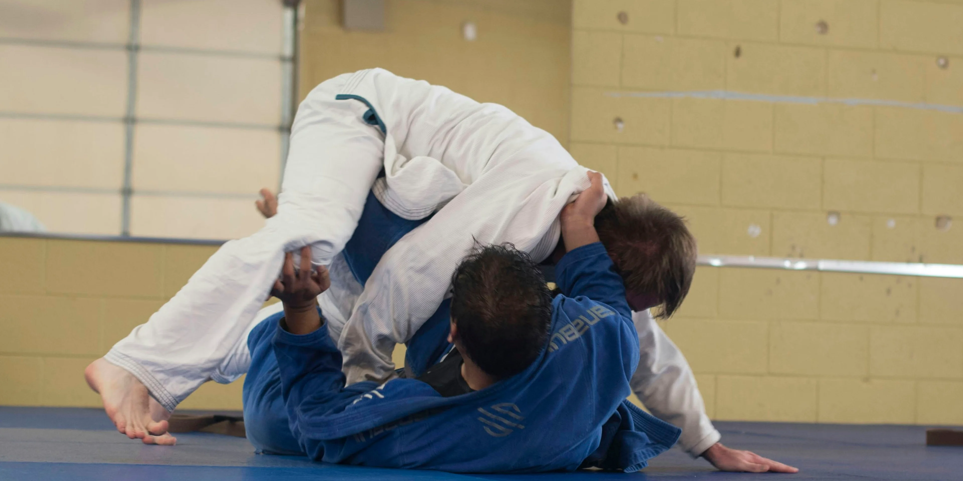 photo of two man wearing Taekwondo suit.