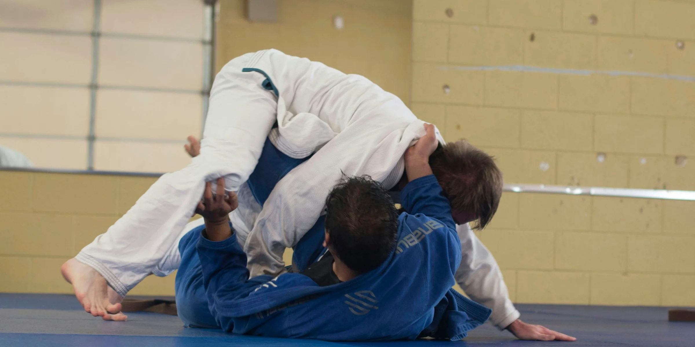 photo of two man wearing Taekwondo suit.